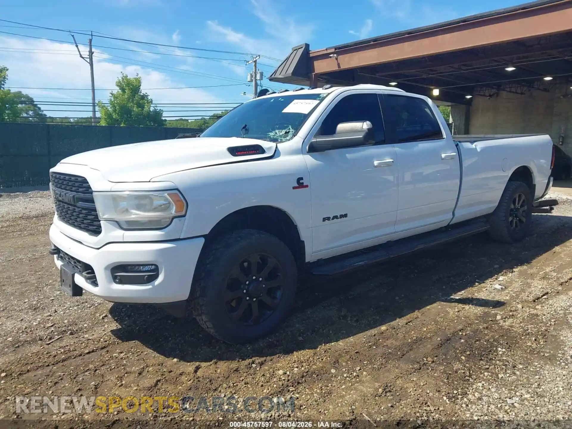 2 Photograph of a damaged car 3C6UR5JL0NG102423 RAM 2500 2022
