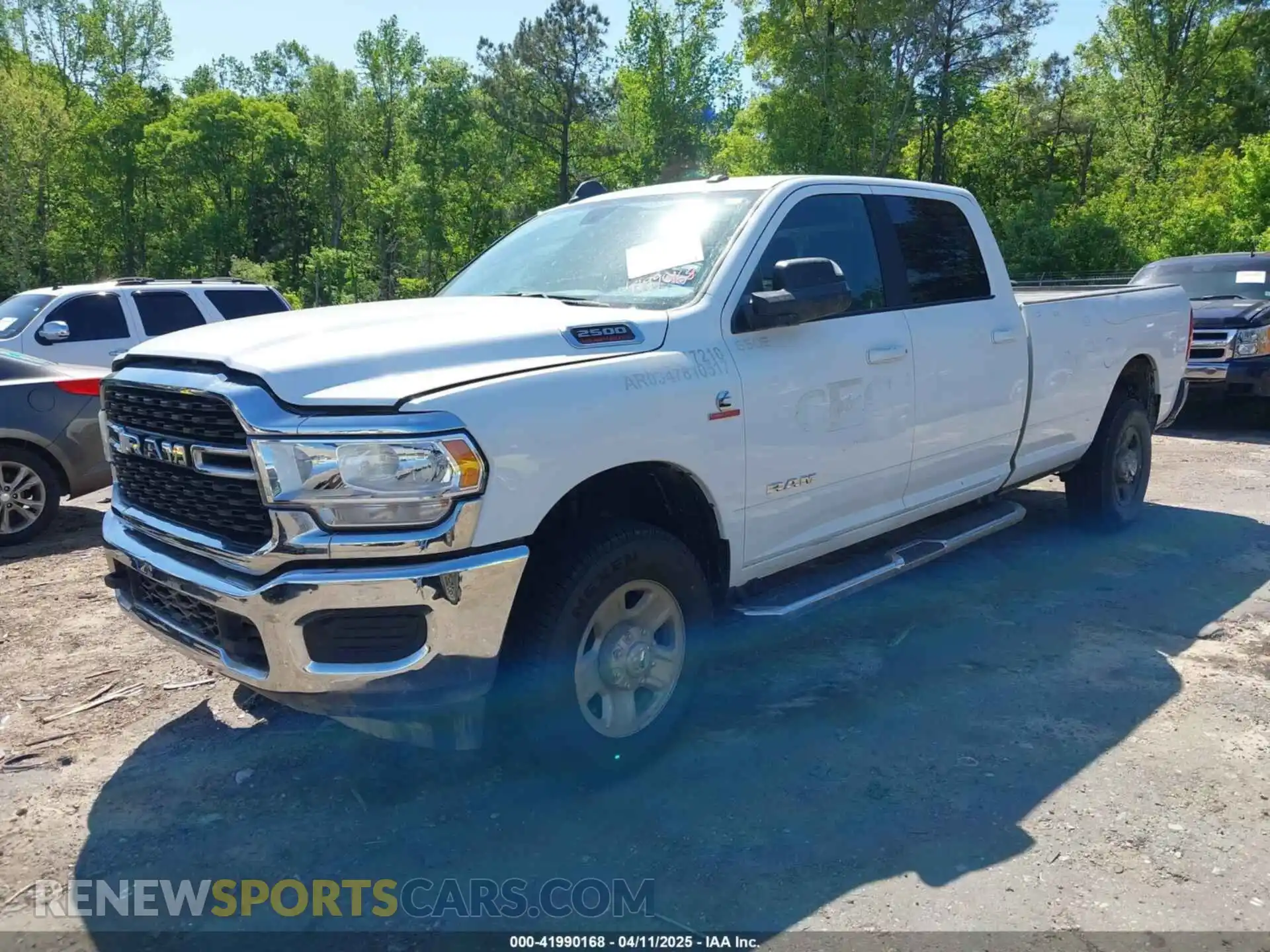2 Photograph of a damaged car 3C6UR5JL1NG178572 RAM 2500 2022