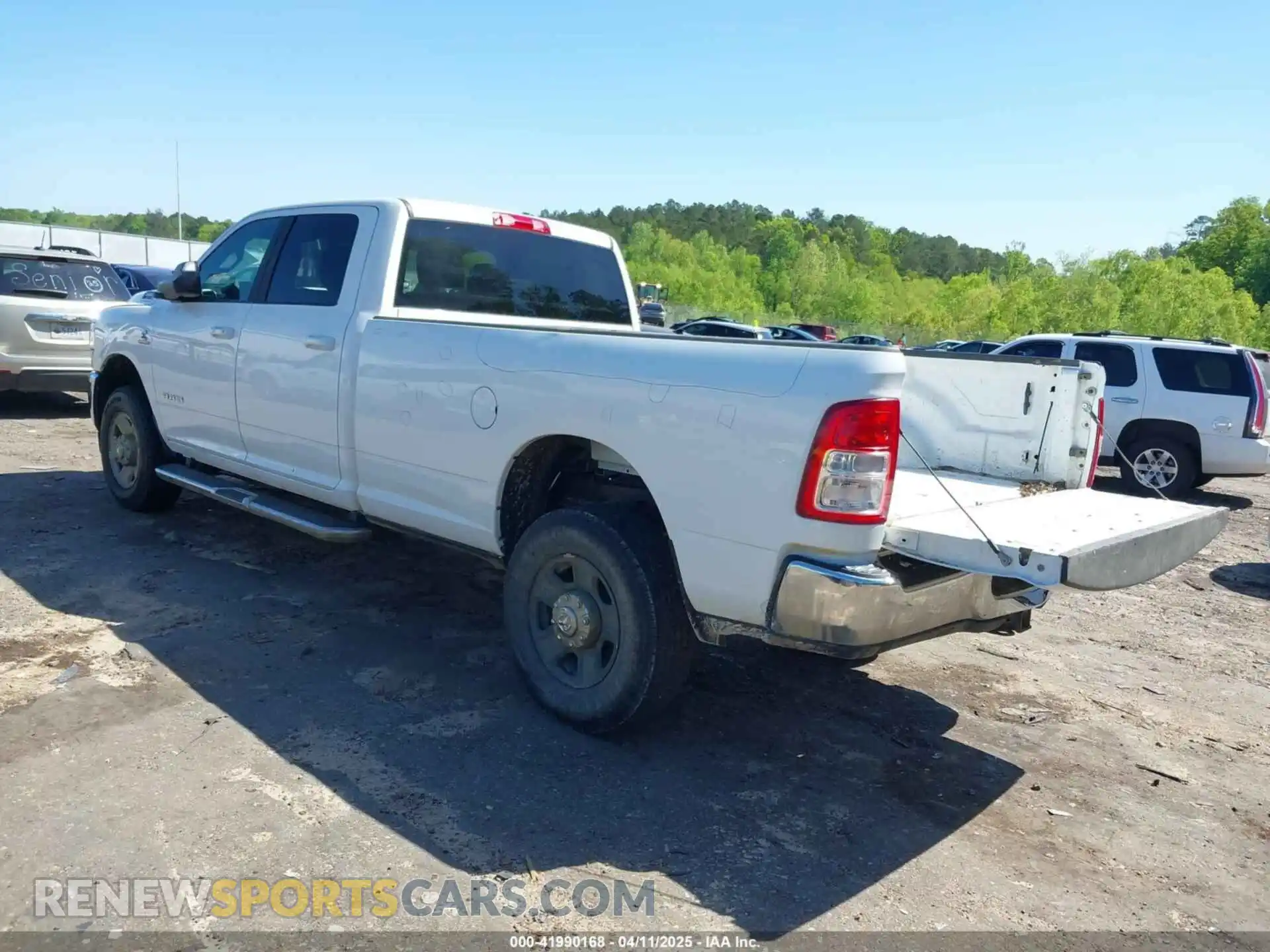3 Photograph of a damaged car 3C6UR5JL1NG178572 RAM 2500 2022