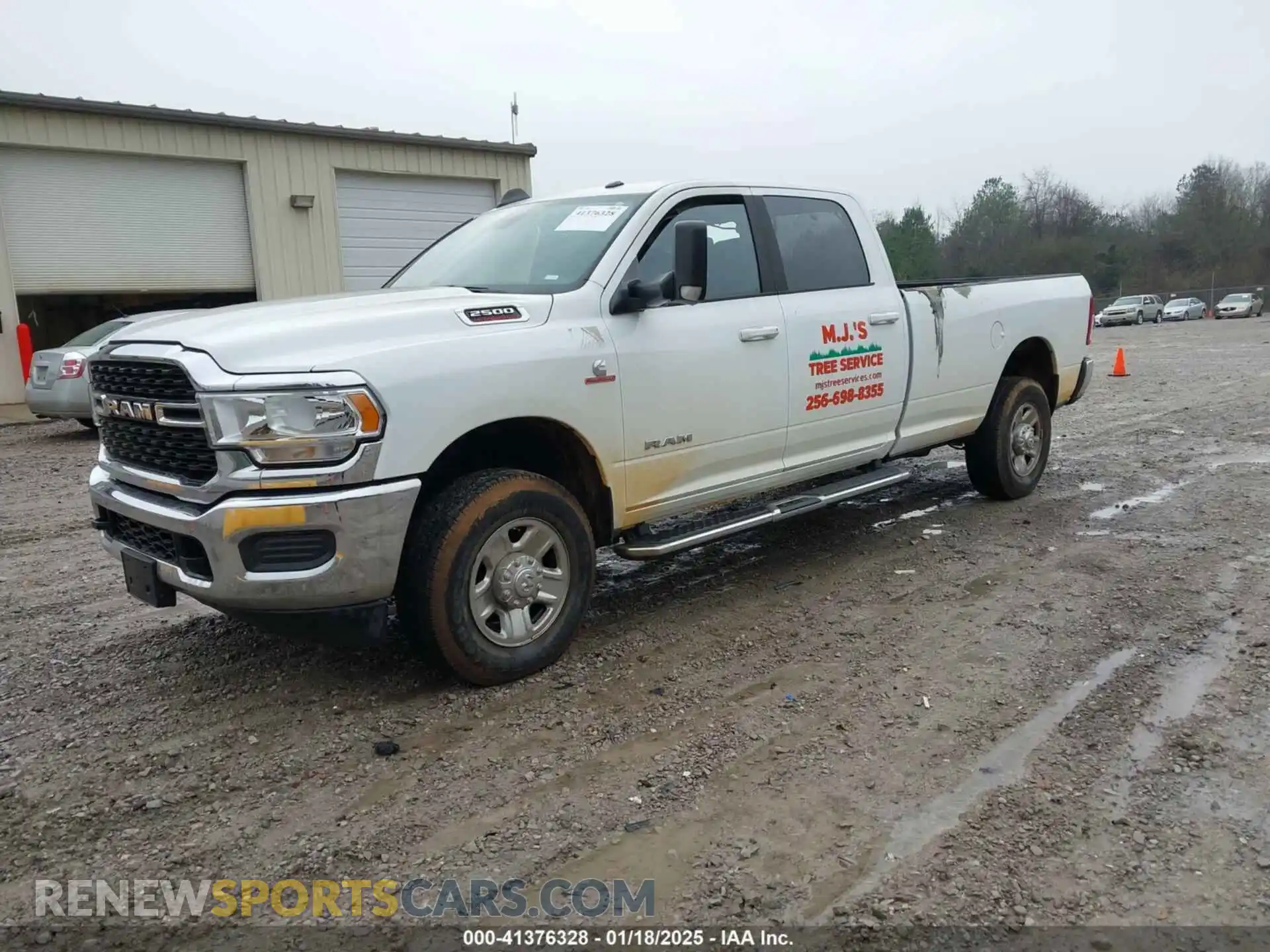 2 Photograph of a damaged car 3C6UR5JL2NG297439 RAM 2500 2022