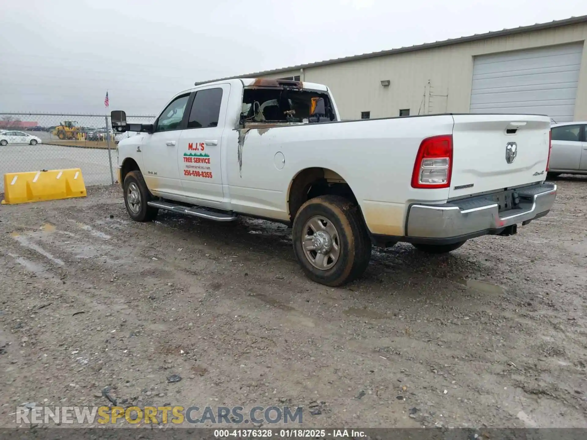 3 Photograph of a damaged car 3C6UR5JL2NG297439 RAM 2500 2022