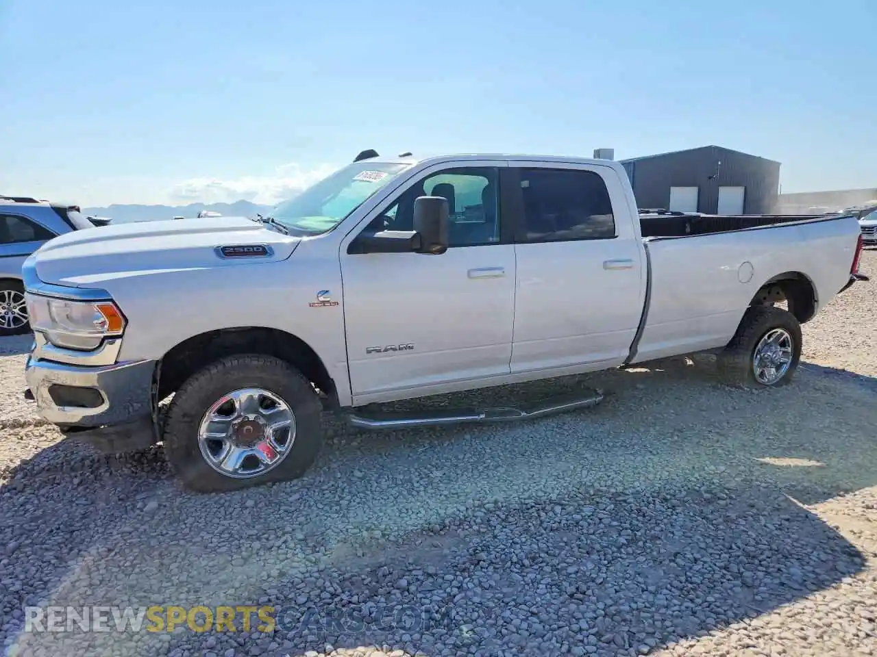 1 Photograph of a damaged car 3C6UR5JL3NG178654 RAM 2500 2022