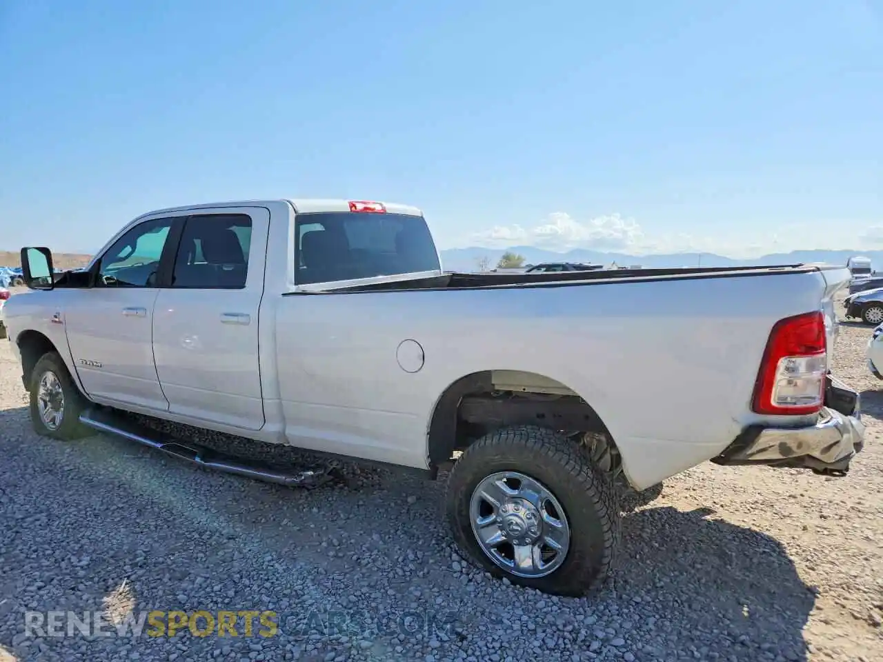 2 Photograph of a damaged car 3C6UR5JL3NG178654 RAM 2500 2022