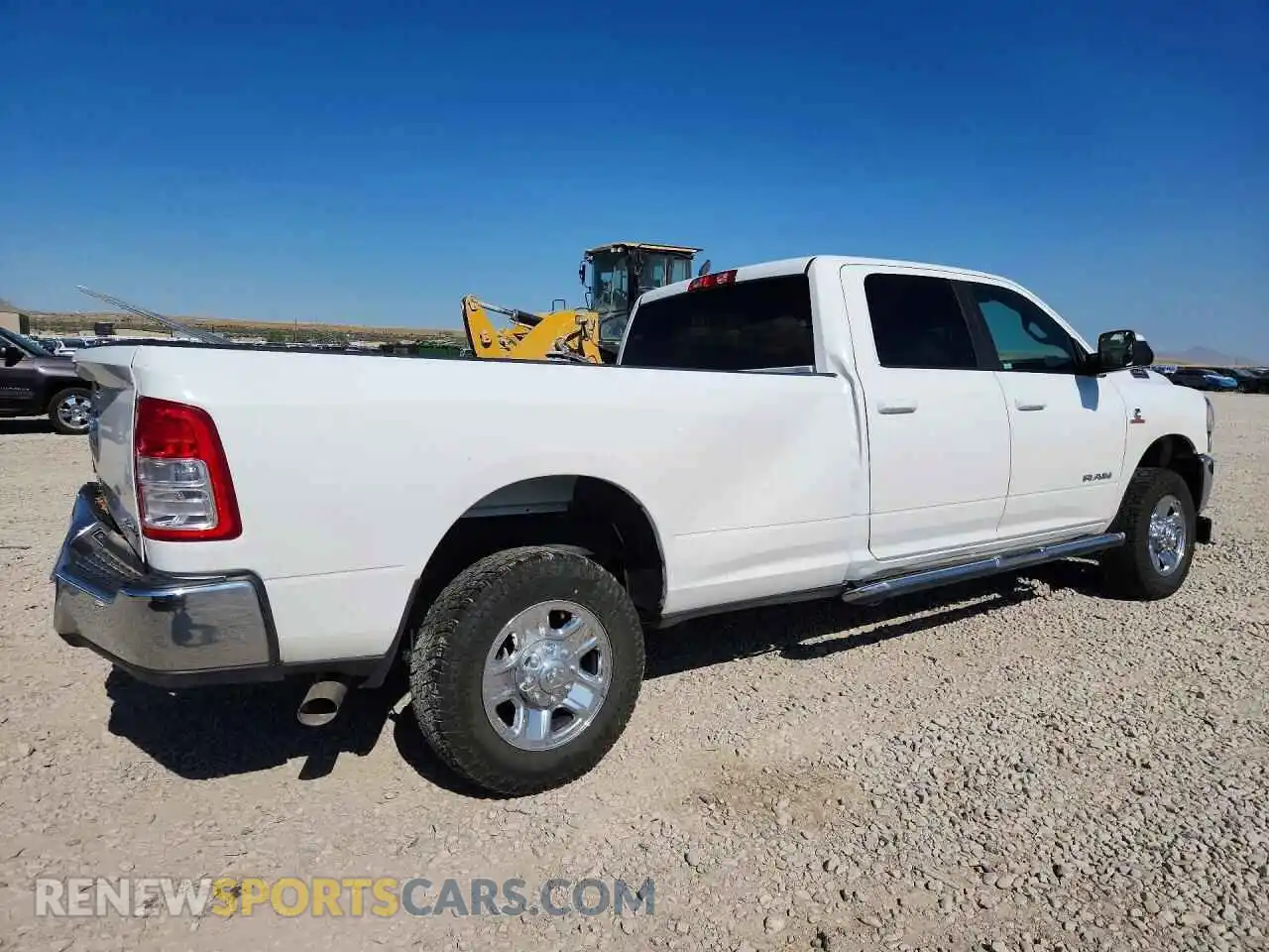 3 Photograph of a damaged car 3C6UR5JL3NG178654 RAM 2500 2022