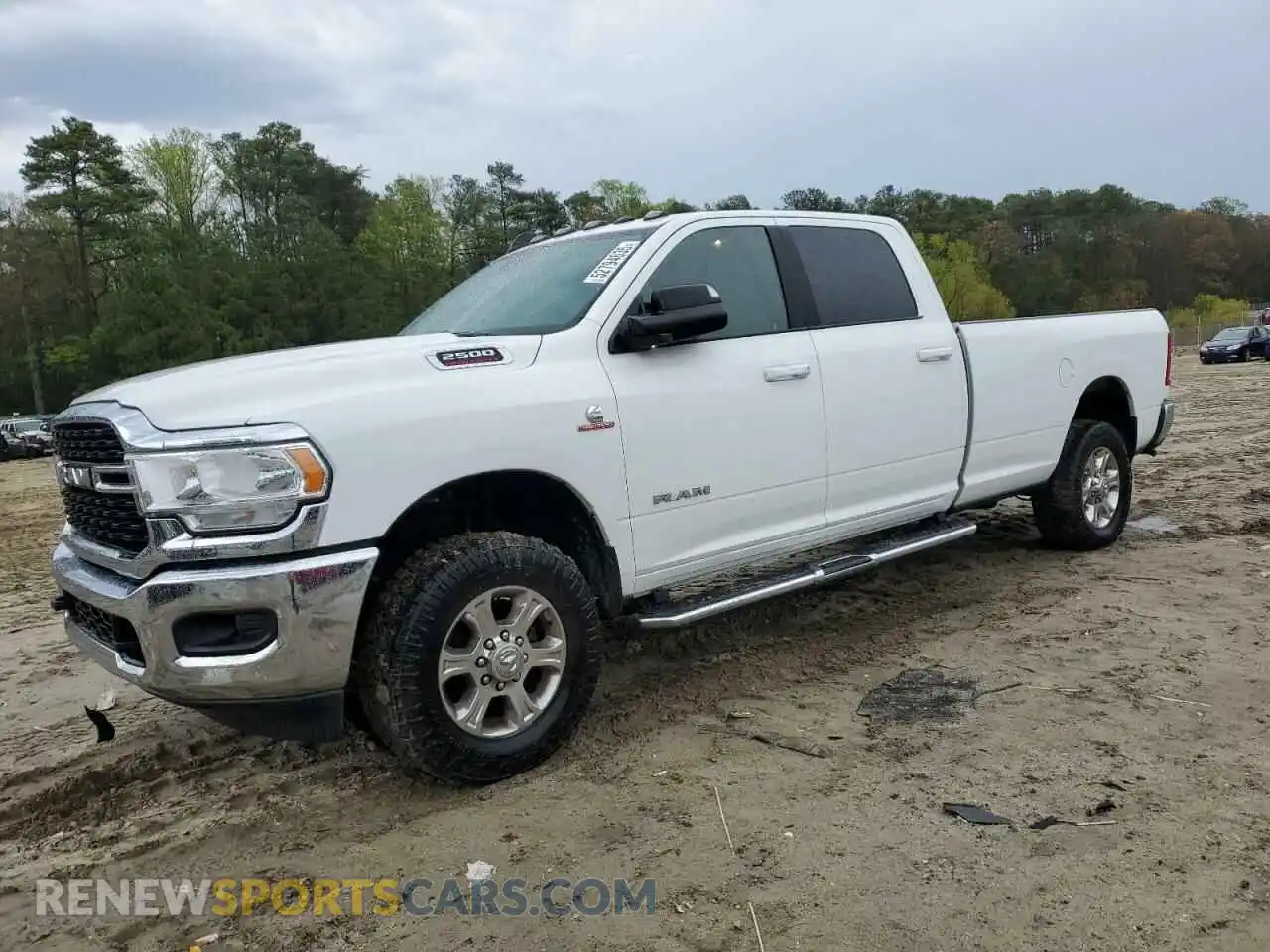 1 Photograph of a damaged car 3C6UR5JL4NG156579 RAM 2500 2022