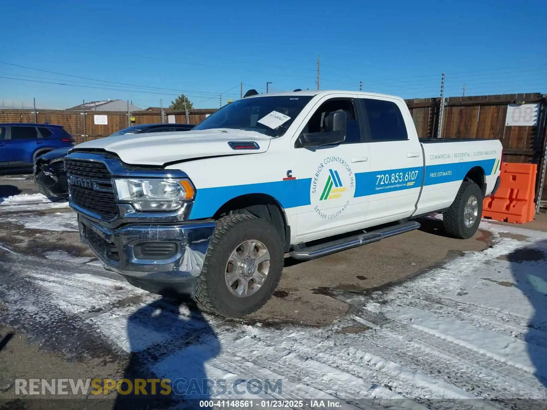 2 Photograph of a damaged car 3C6UR5JL6NG104080 RAM 2500 2022