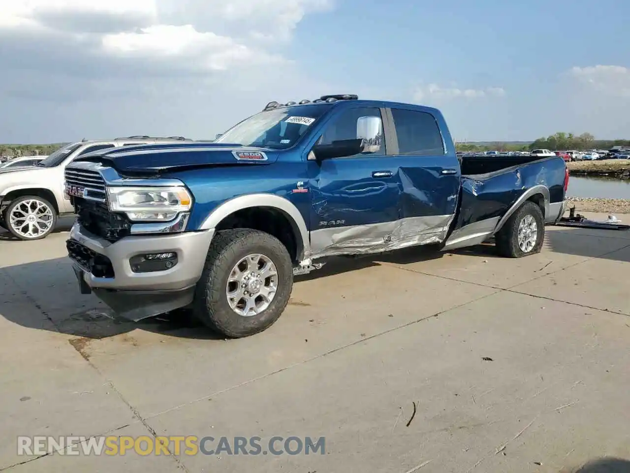 1 Photograph of a damaged car 3C6UR5KL5NG178279 RAM 2500 2022