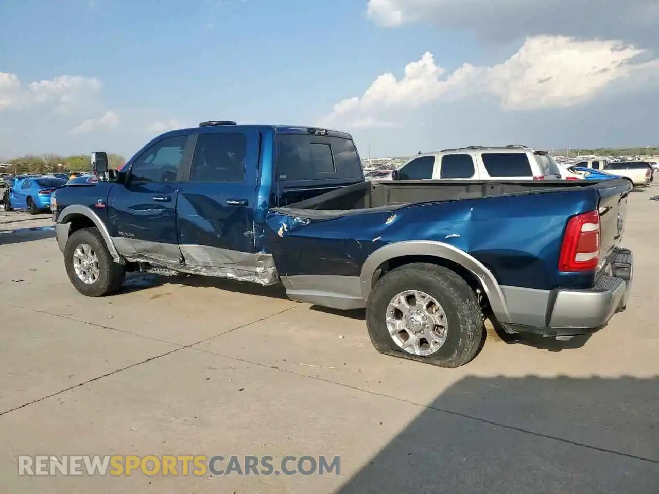 2 Photograph of a damaged car 3C6UR5KL5NG178279 RAM 2500 2022