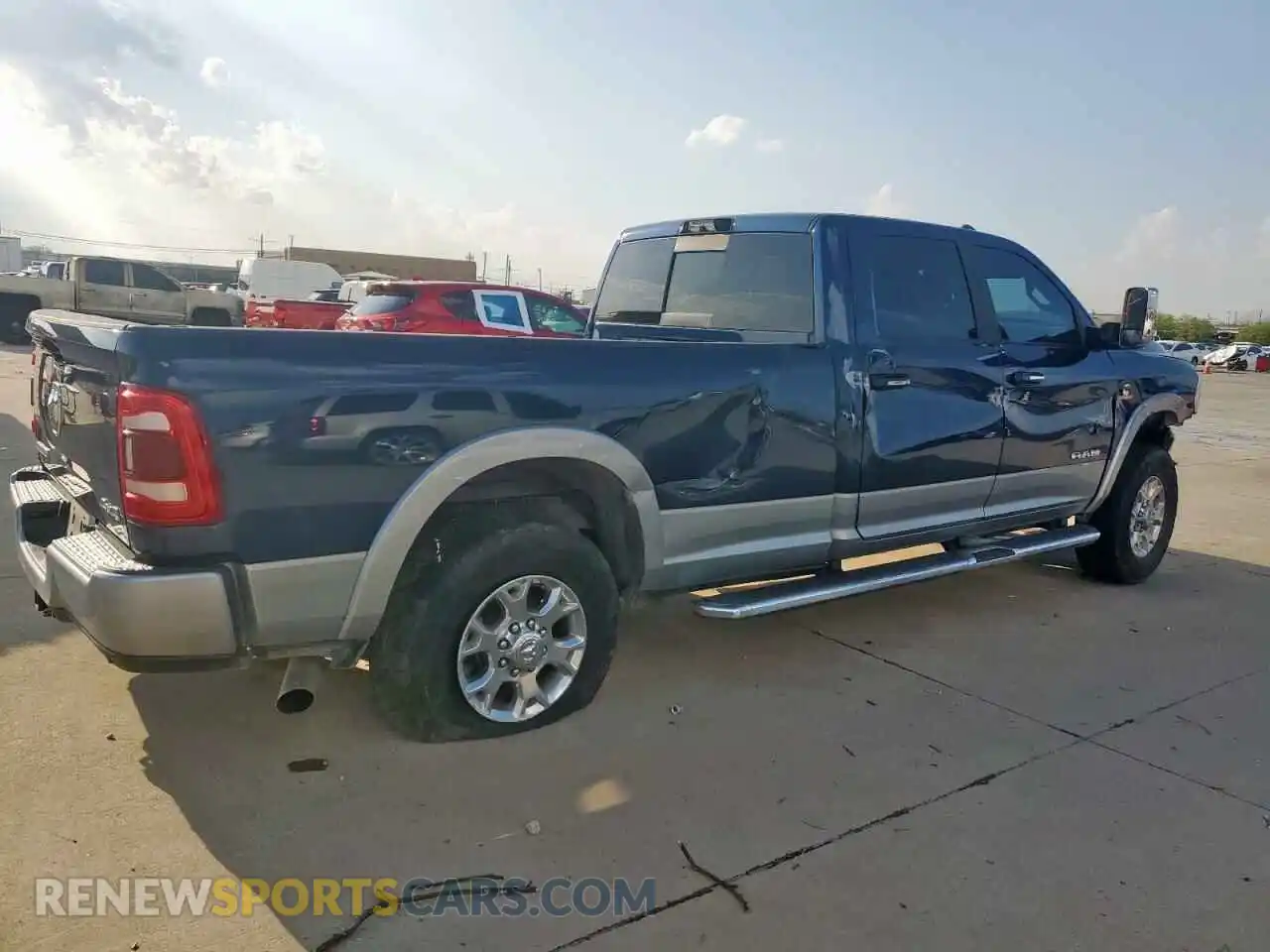 3 Photograph of a damaged car 3C6UR5KL5NG178279 RAM 2500 2022