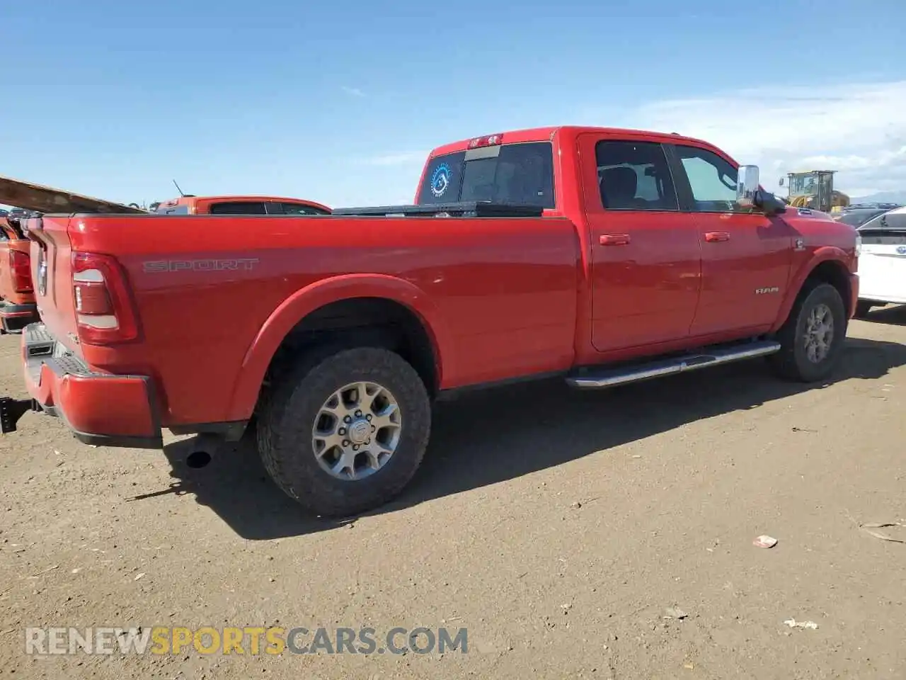 3 Photograph of a damaged car 3C6UR5KL6NG219129 RAM 2500 2022