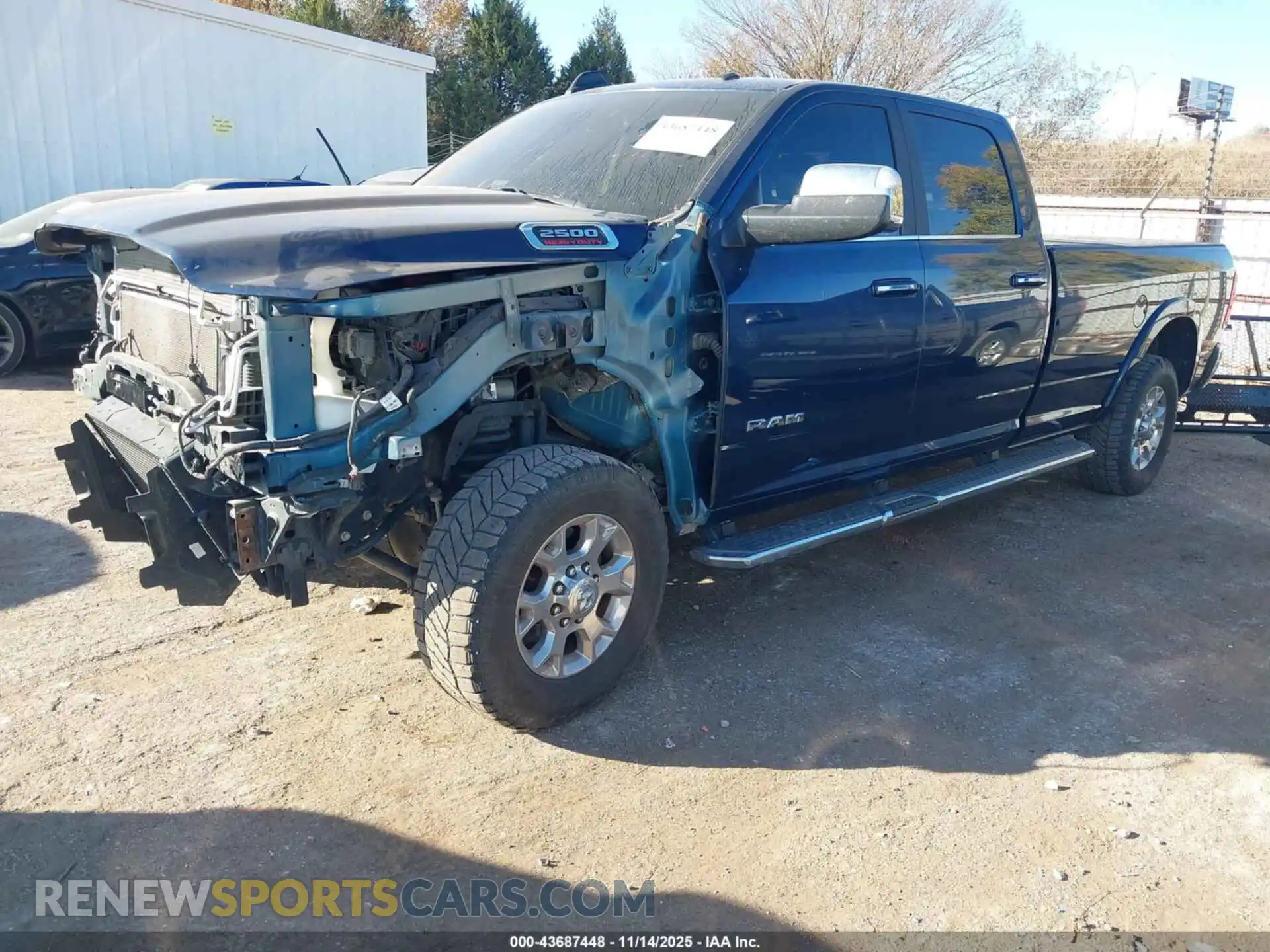 2 Photograph of a damaged car 3C6UR5KL9NG319452 RAM 2500 2022