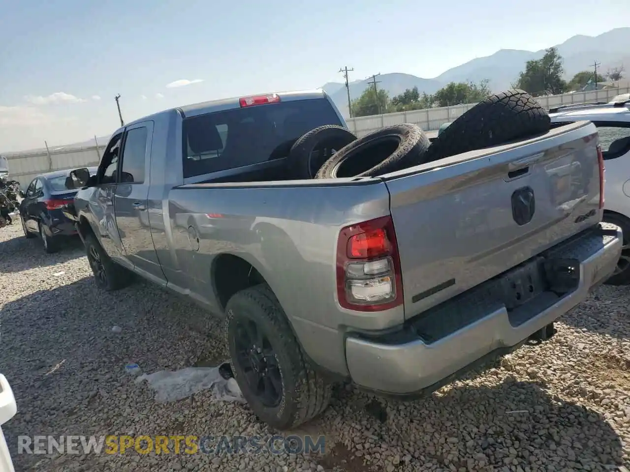2 Photograph of a damaged car 3C6UR5ML2NG183873 RAM 2500 2022