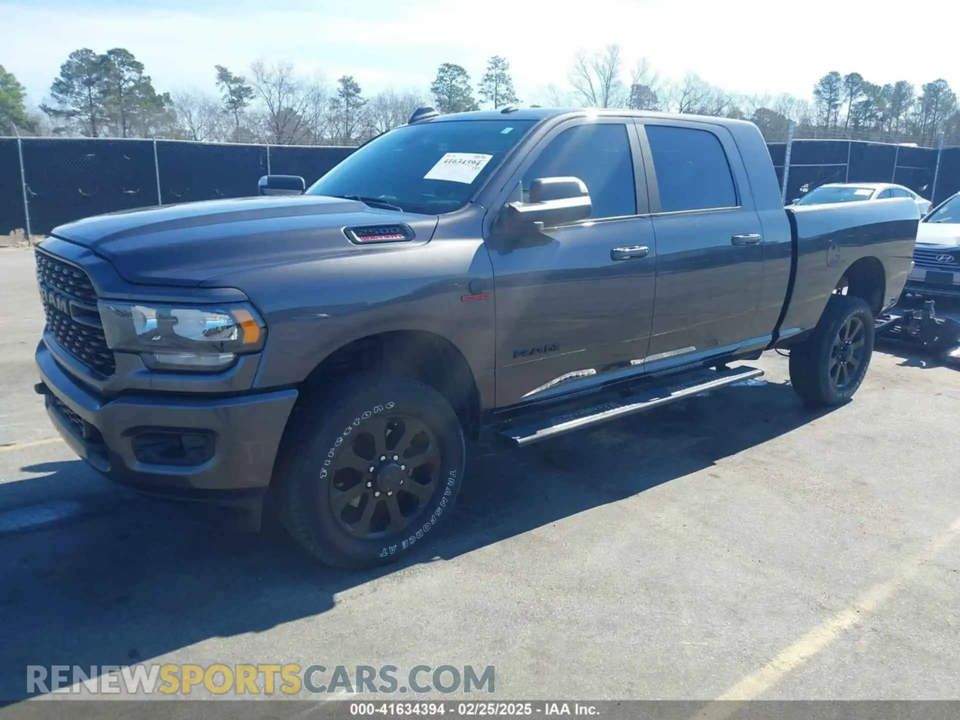 2 Photograph of a damaged car 3C6UR5ML7NG289963 RAM 2500 2022