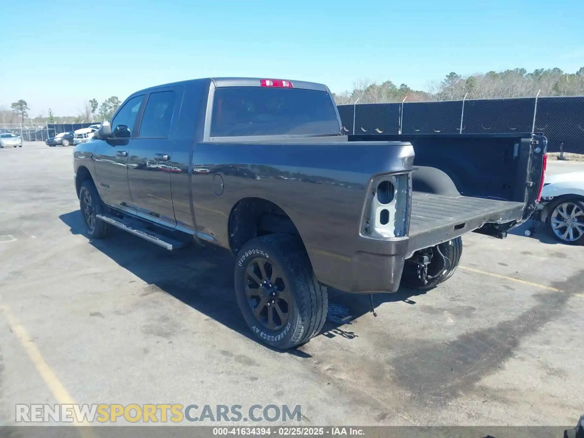 3 Photograph of a damaged car 3C6UR5ML7NG289963 RAM 2500 2022