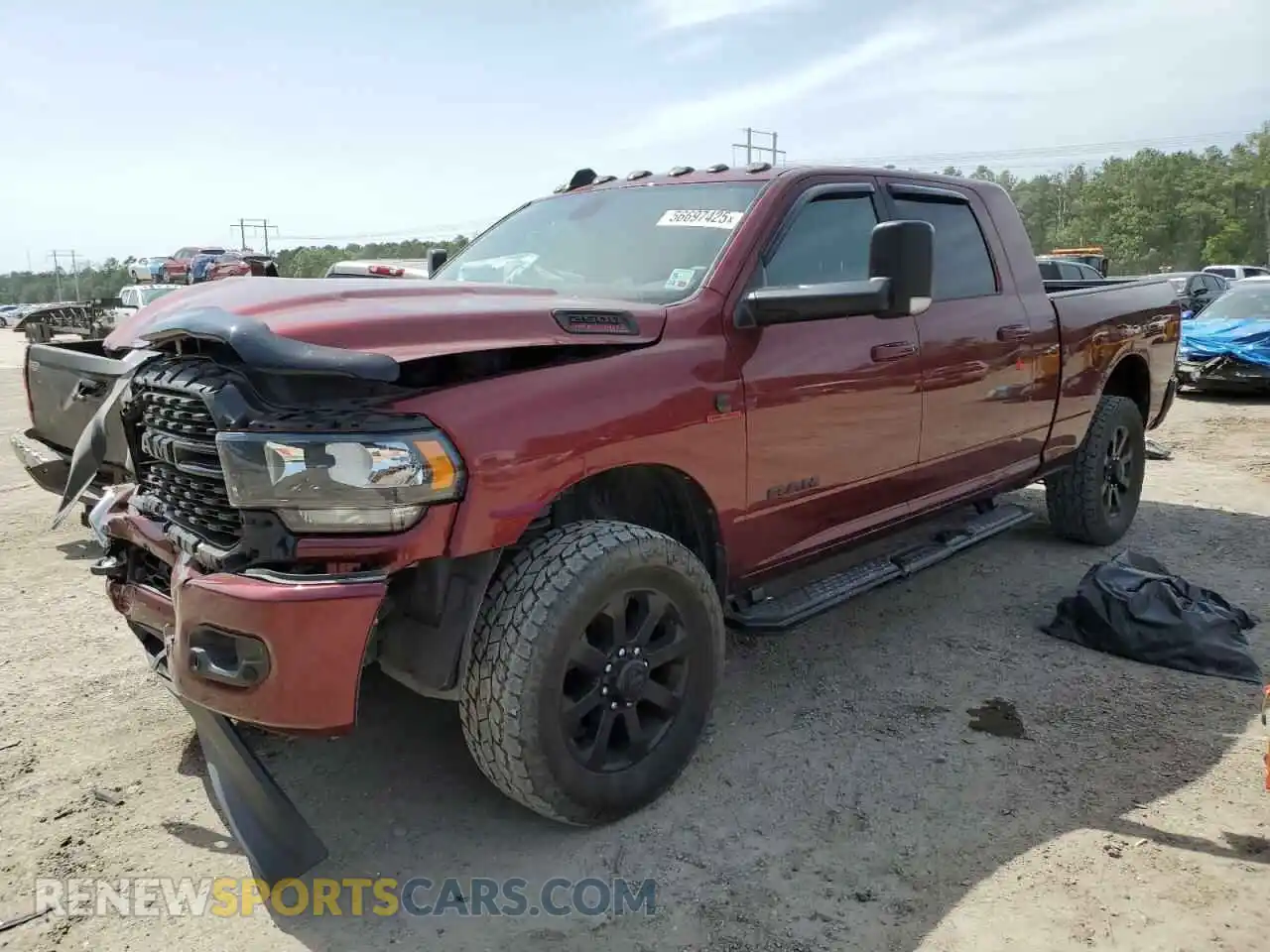 1 Photograph of a damaged car 3C6UR5MLXNG309851 RAM 2500 2022