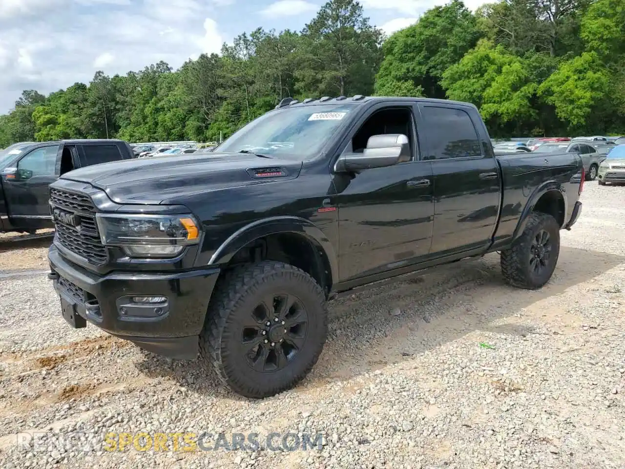 1 Photograph of a damaged car 3C6UR5SL5NG185989 RAM 2500 2022