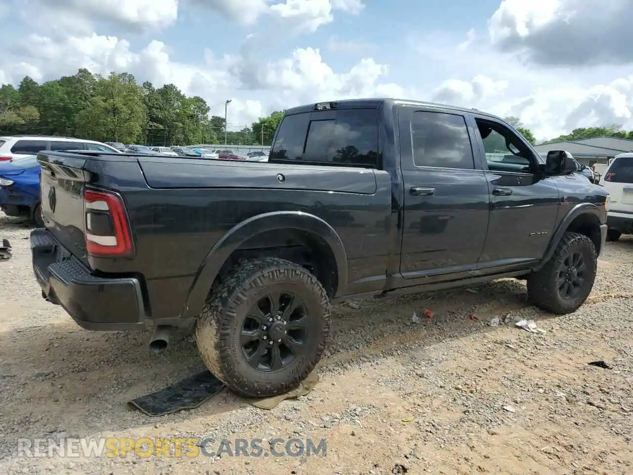 3 Photograph of a damaged car 3C6UR5SL5NG185989 RAM 2500 2022