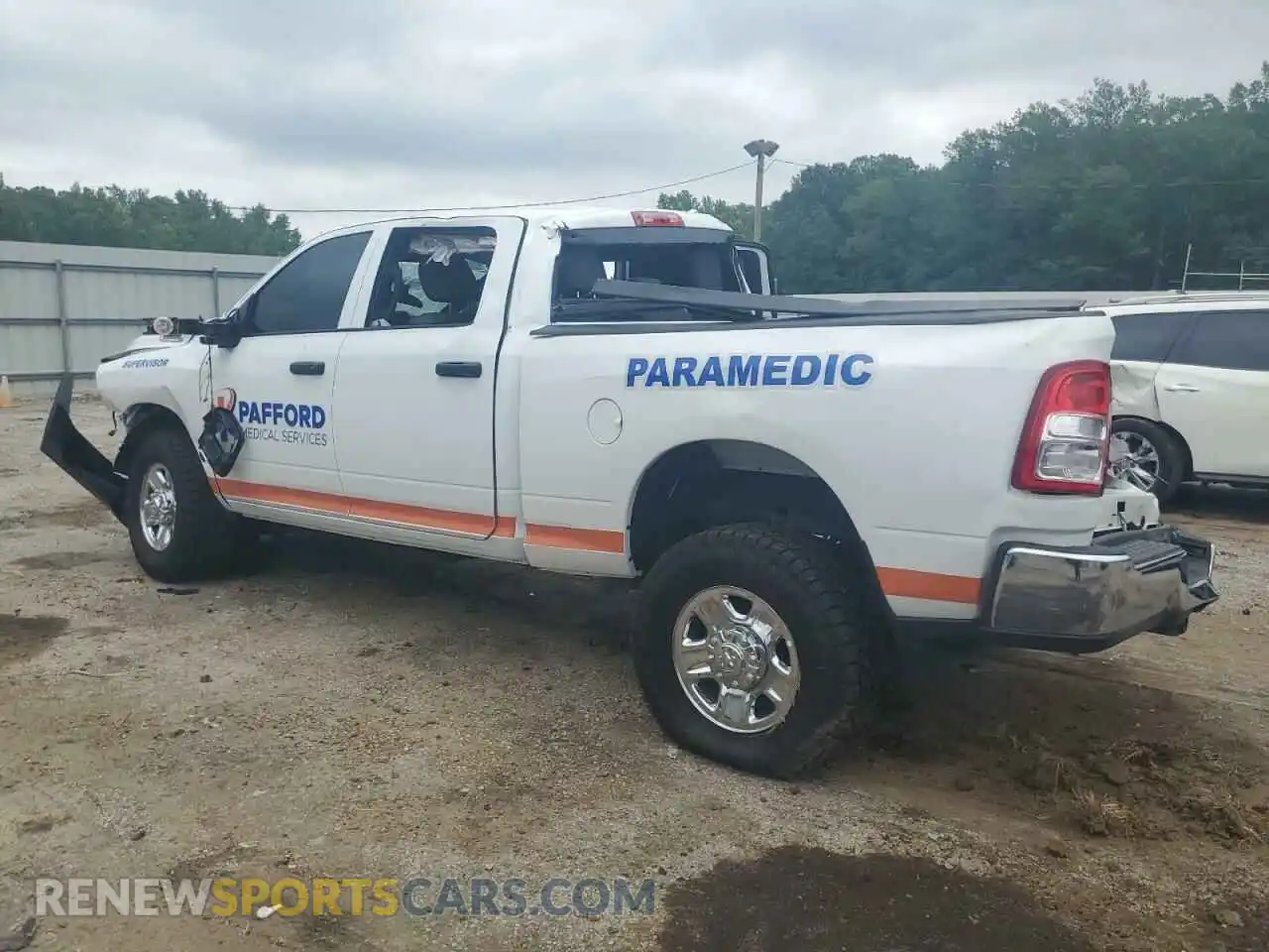 2 Photograph of a damaged car 3C6UR5CJ9PG614227 RAM 2500 2023