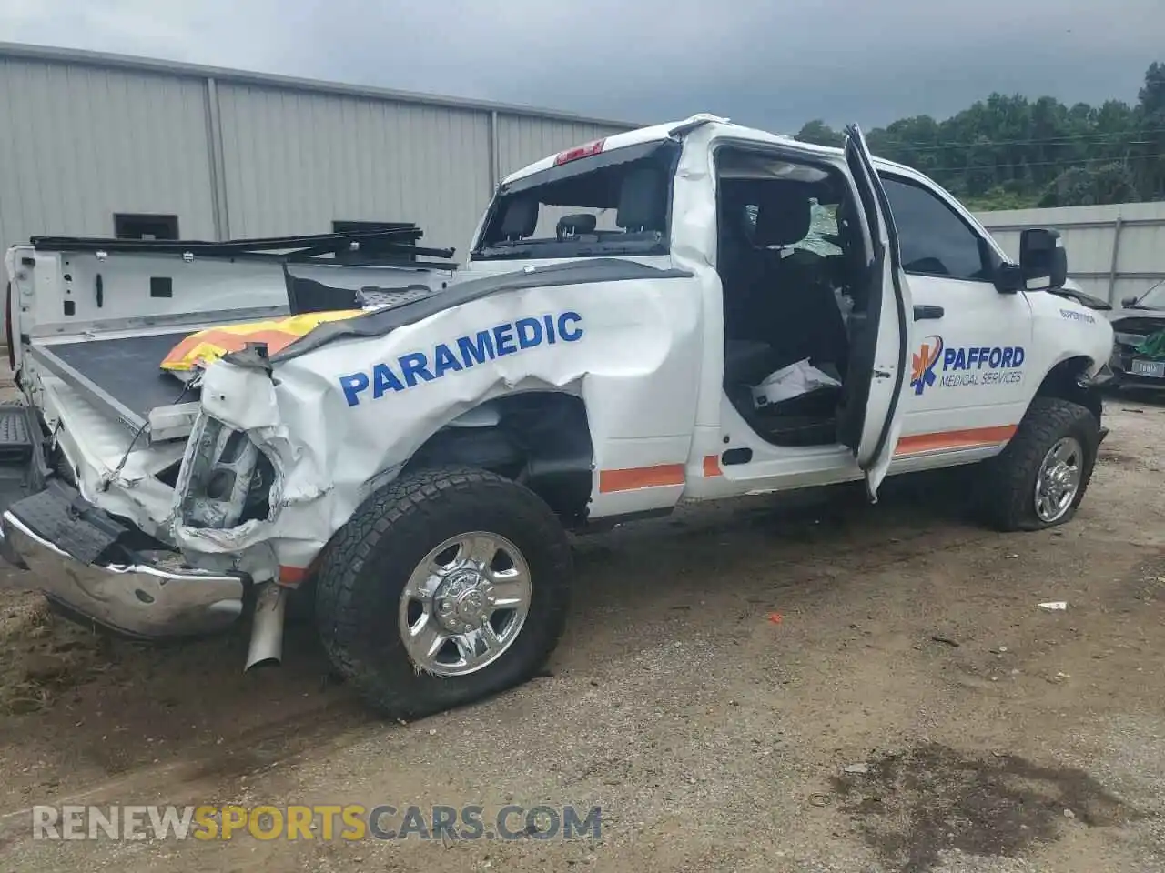 3 Photograph of a damaged car 3C6UR5CJ9PG614227 RAM 2500 2023