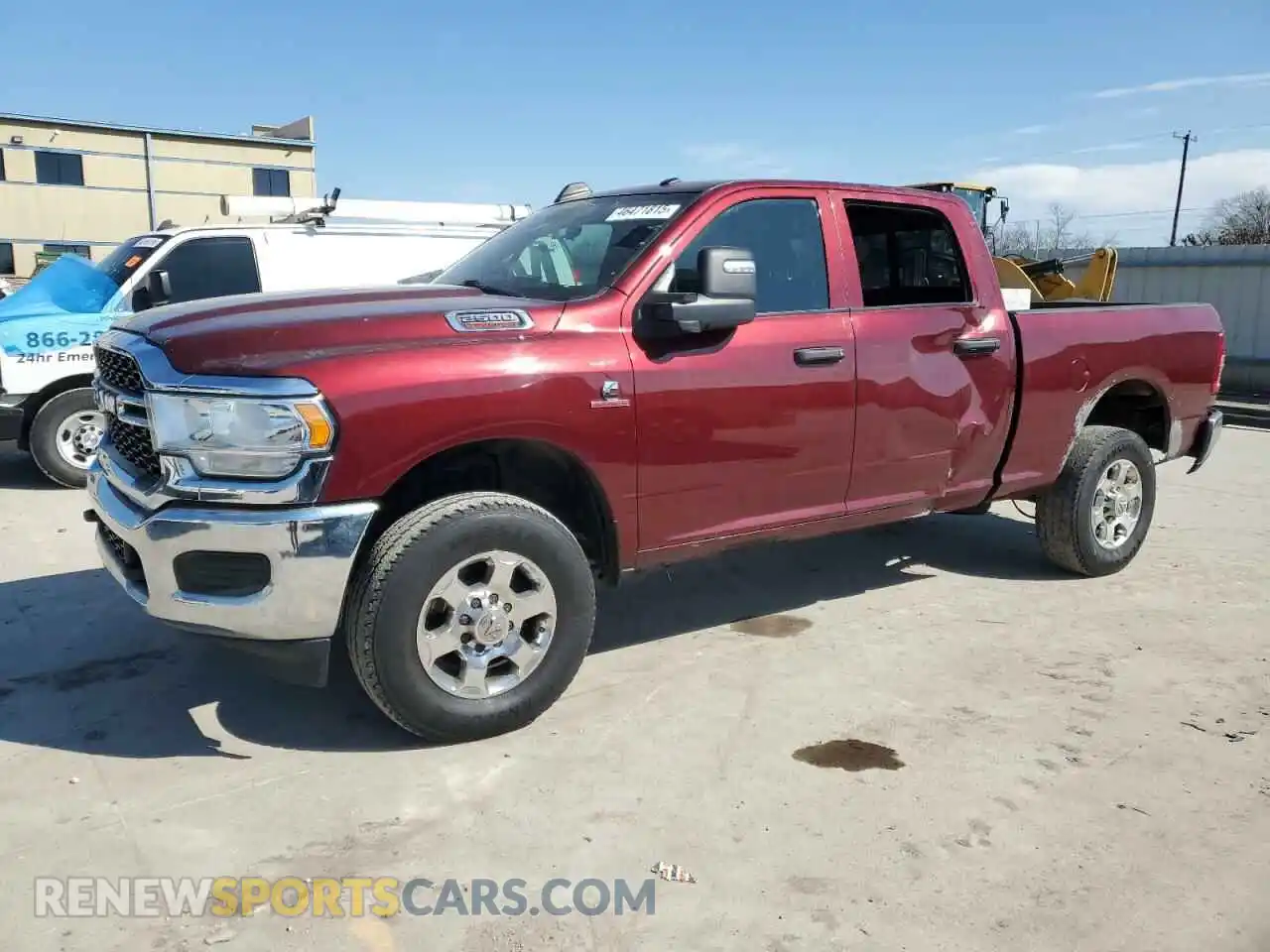 1 Photograph of a damaged car 3C6UR5CL1PG504080 RAM 2500 2023