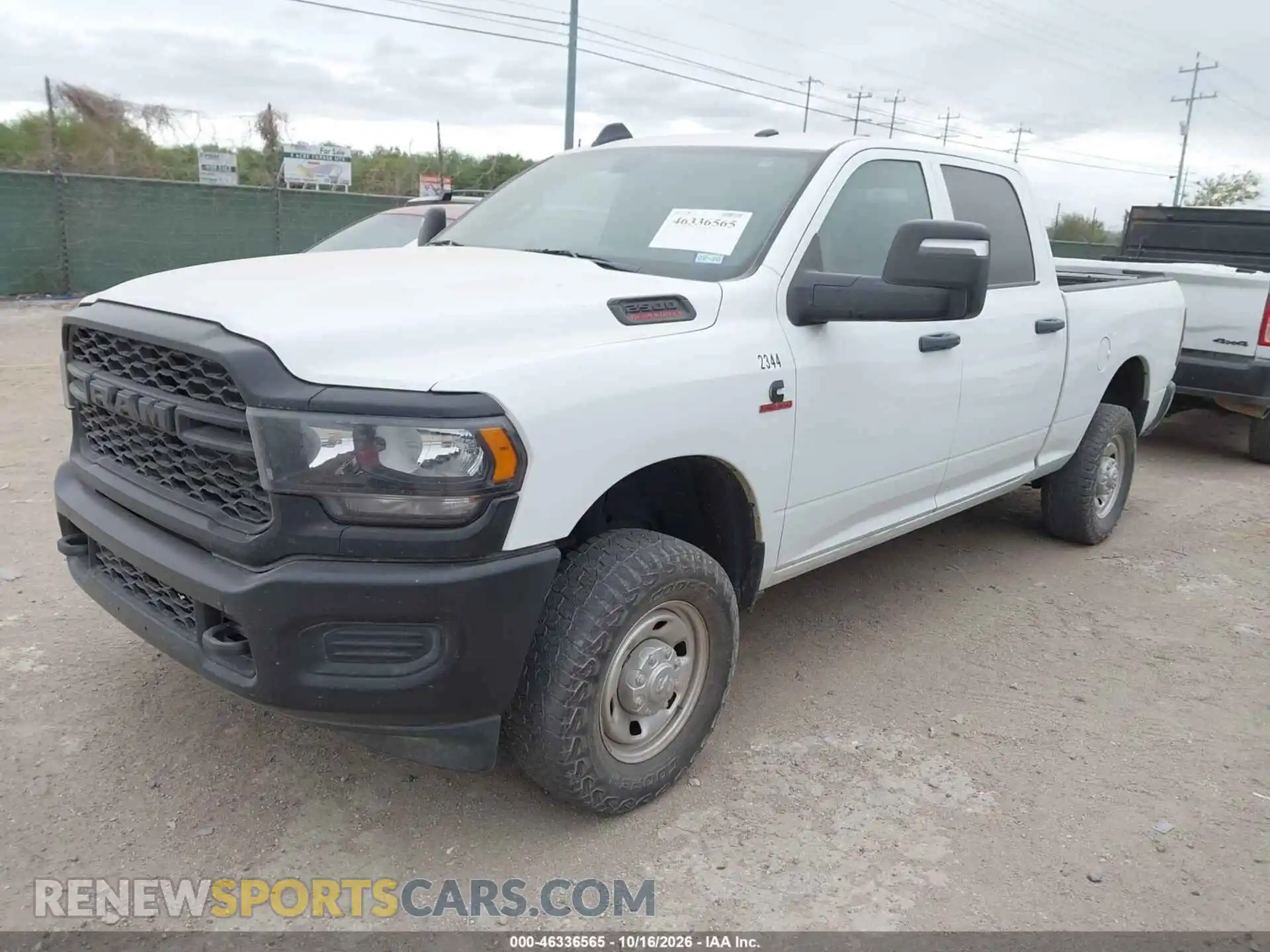 2 fotografías del automóvil dañado 3C6UR5CL1PG610397 RAM 2500 2023