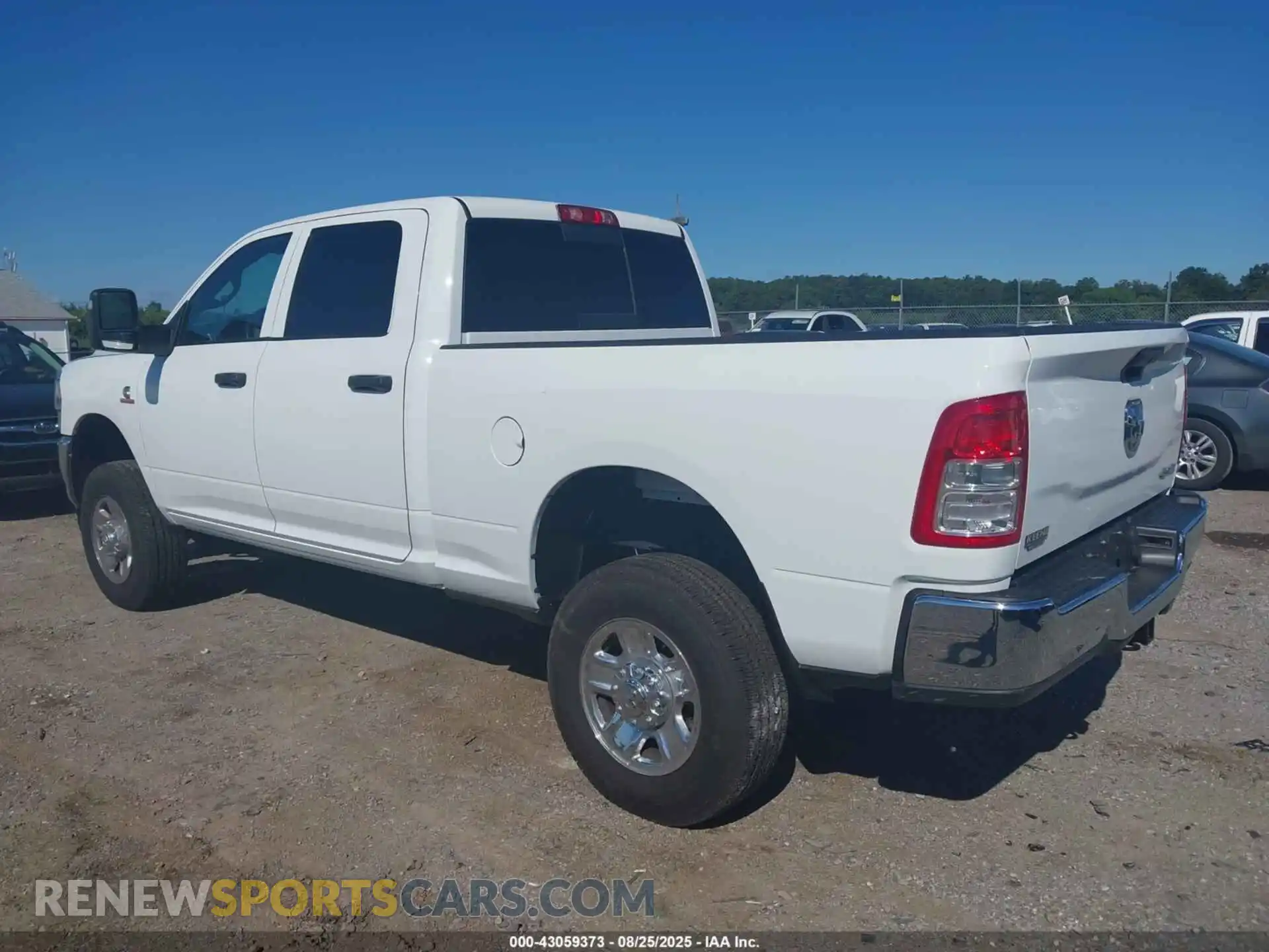 3 Photograph of a damaged car 3C6UR5CL2PG502757 RAM 2500 2023
