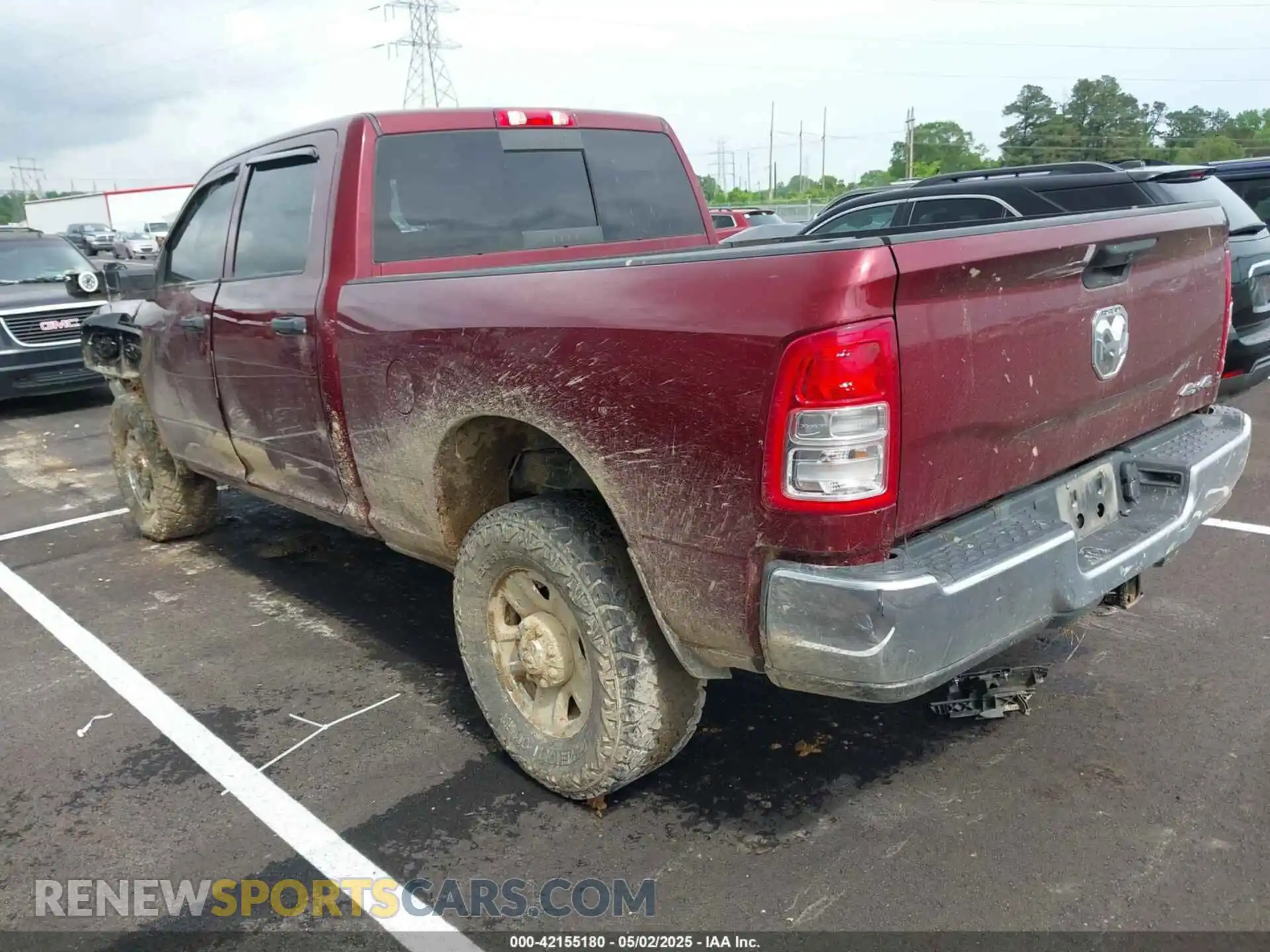3 Photograph of a damaged car 3C6UR5CL3PG504534 RAM 2500 2023