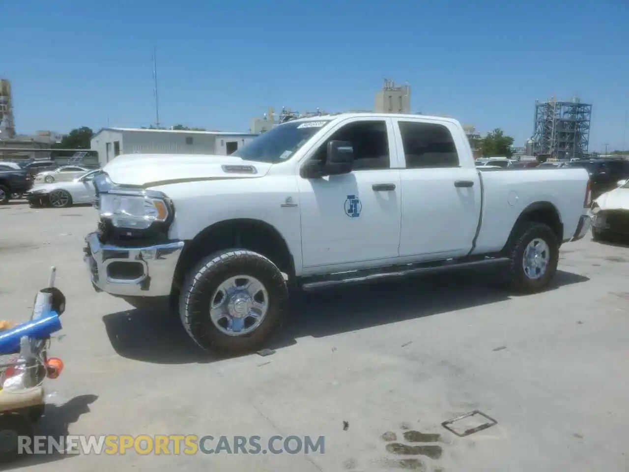 1 Photograph of a damaged car 3C6UR5CL3PG636676 RAM 2500 2023