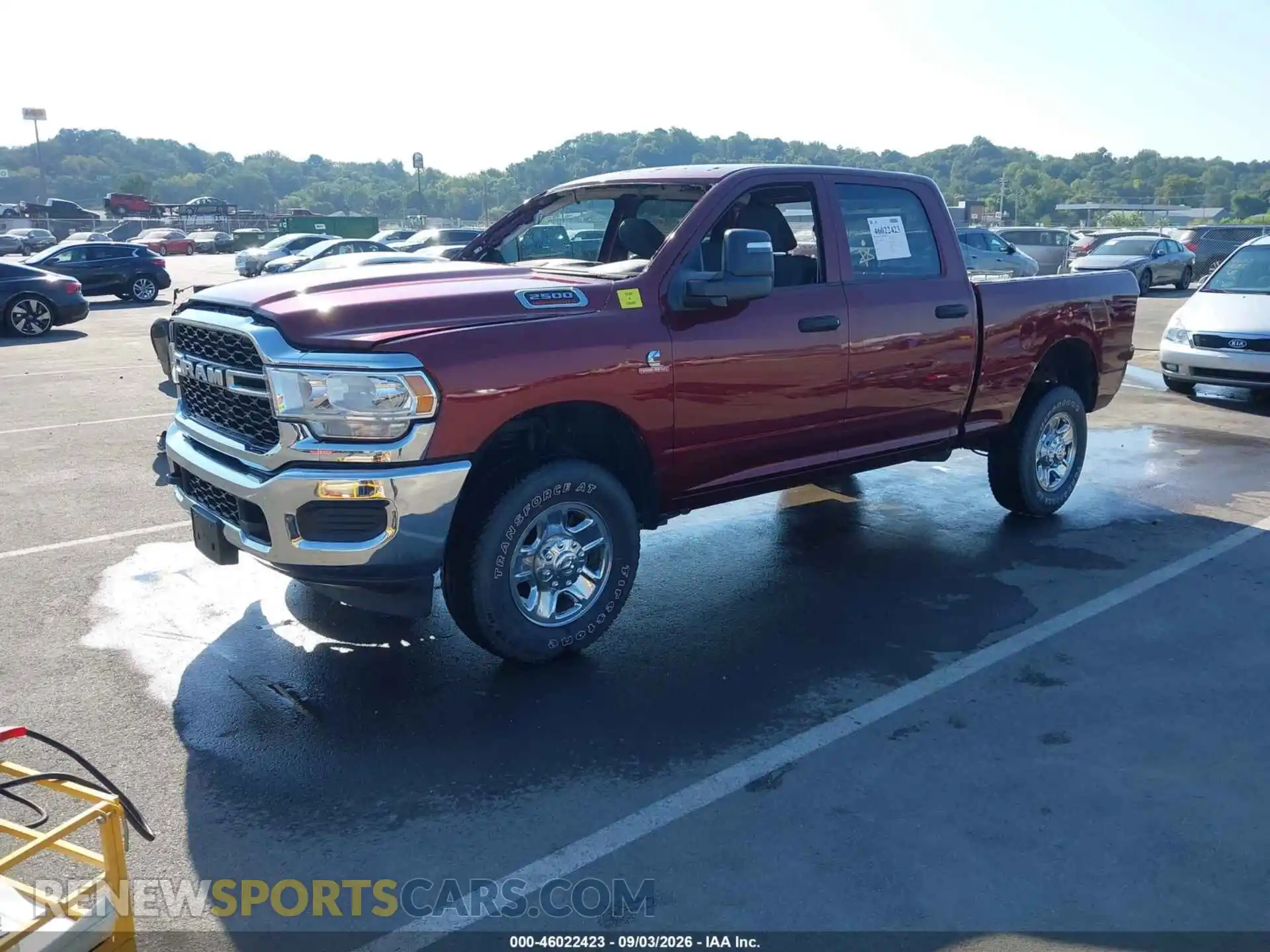 2 Photograph of a damaged car 3C6UR5CL4PG570431 RAM 2500 2023