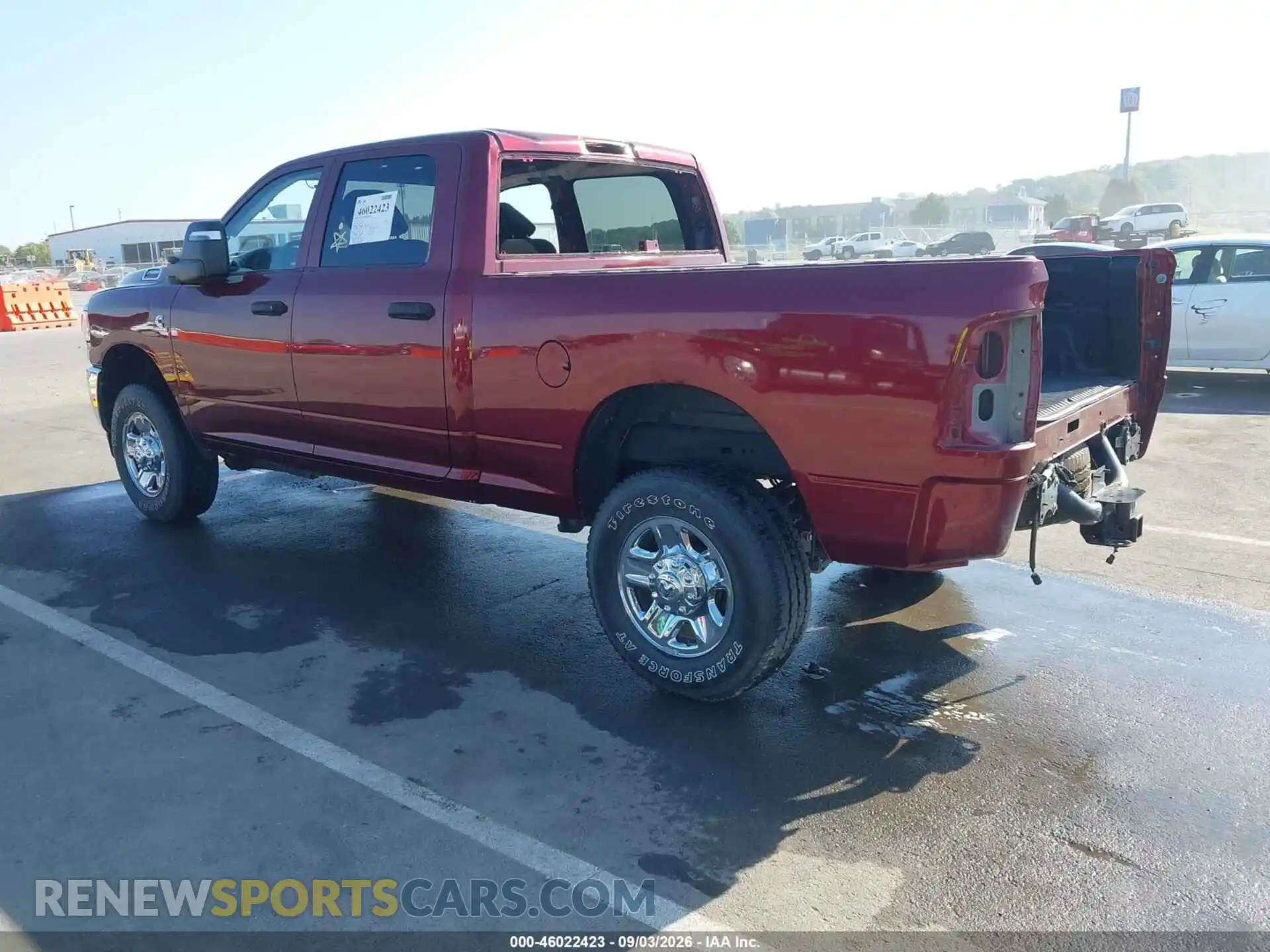3 Photograph of a damaged car 3C6UR5CL4PG570431 RAM 2500 2023