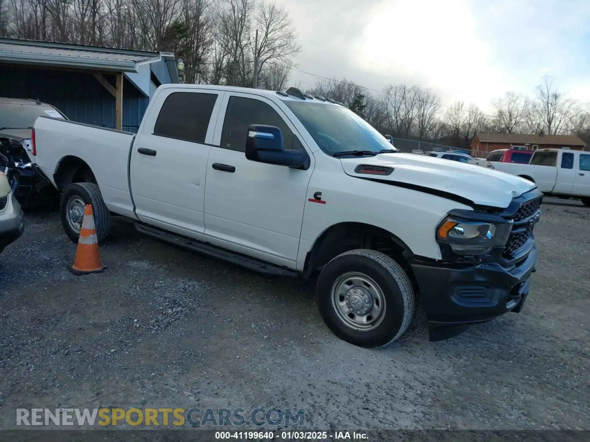 1 Photograph of a damaged car 3C6UR5CL5PG517155 RAM 2500 2023