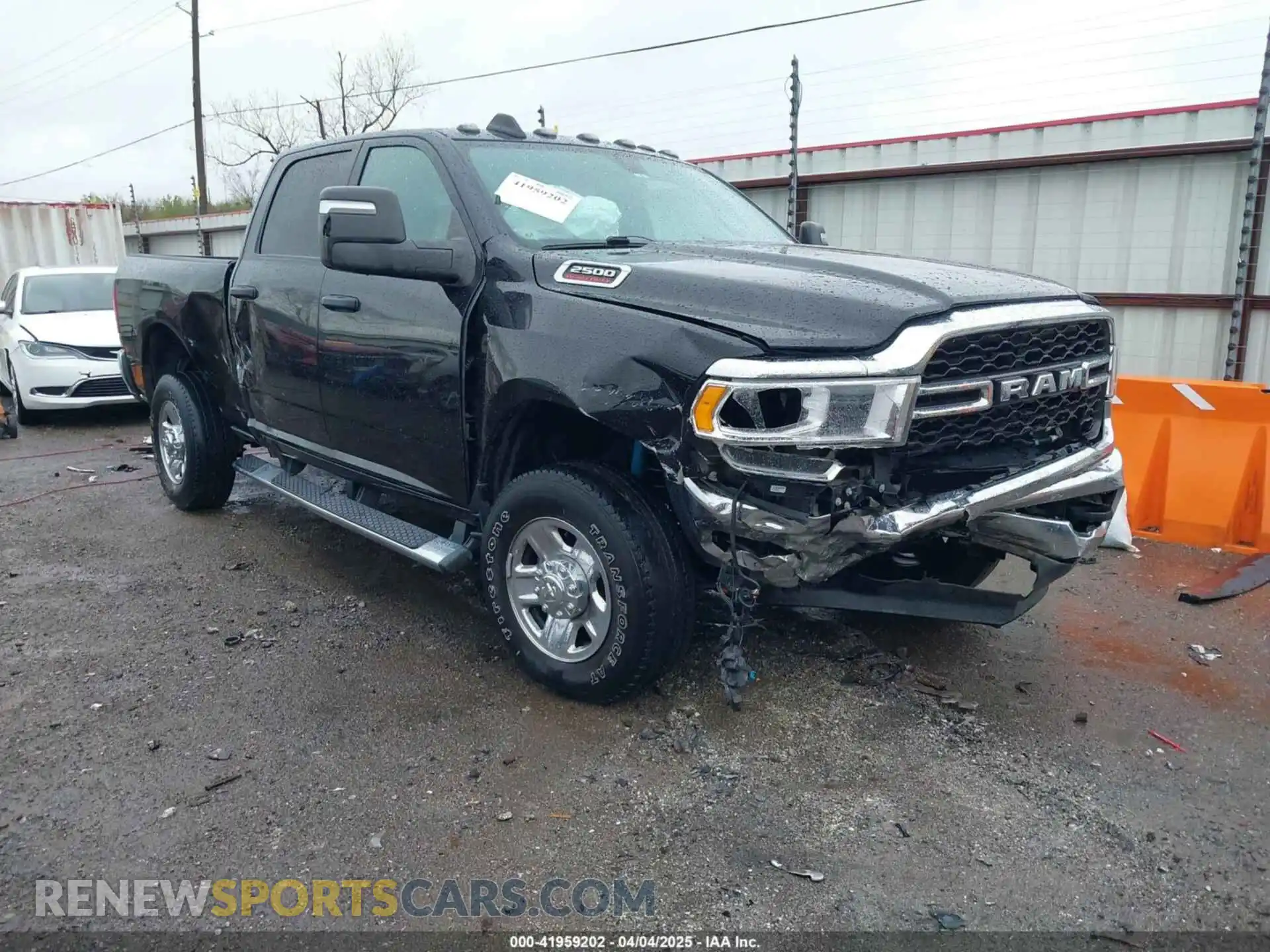 1 Photograph of a damaged car 3C6UR5CL9PG593221 RAM 2500 2023