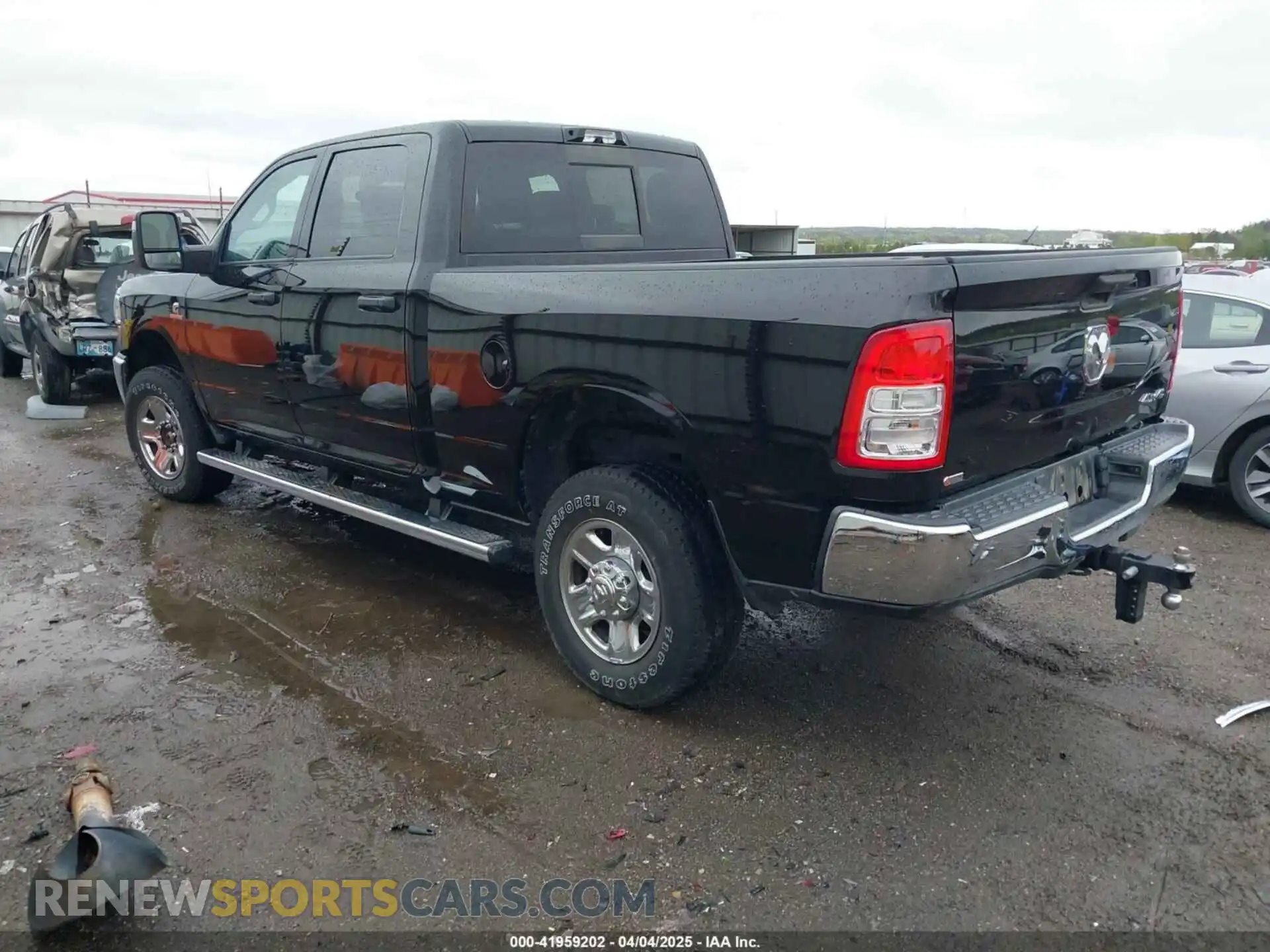 3 Photograph of a damaged car 3C6UR5CL9PG593221 RAM 2500 2023