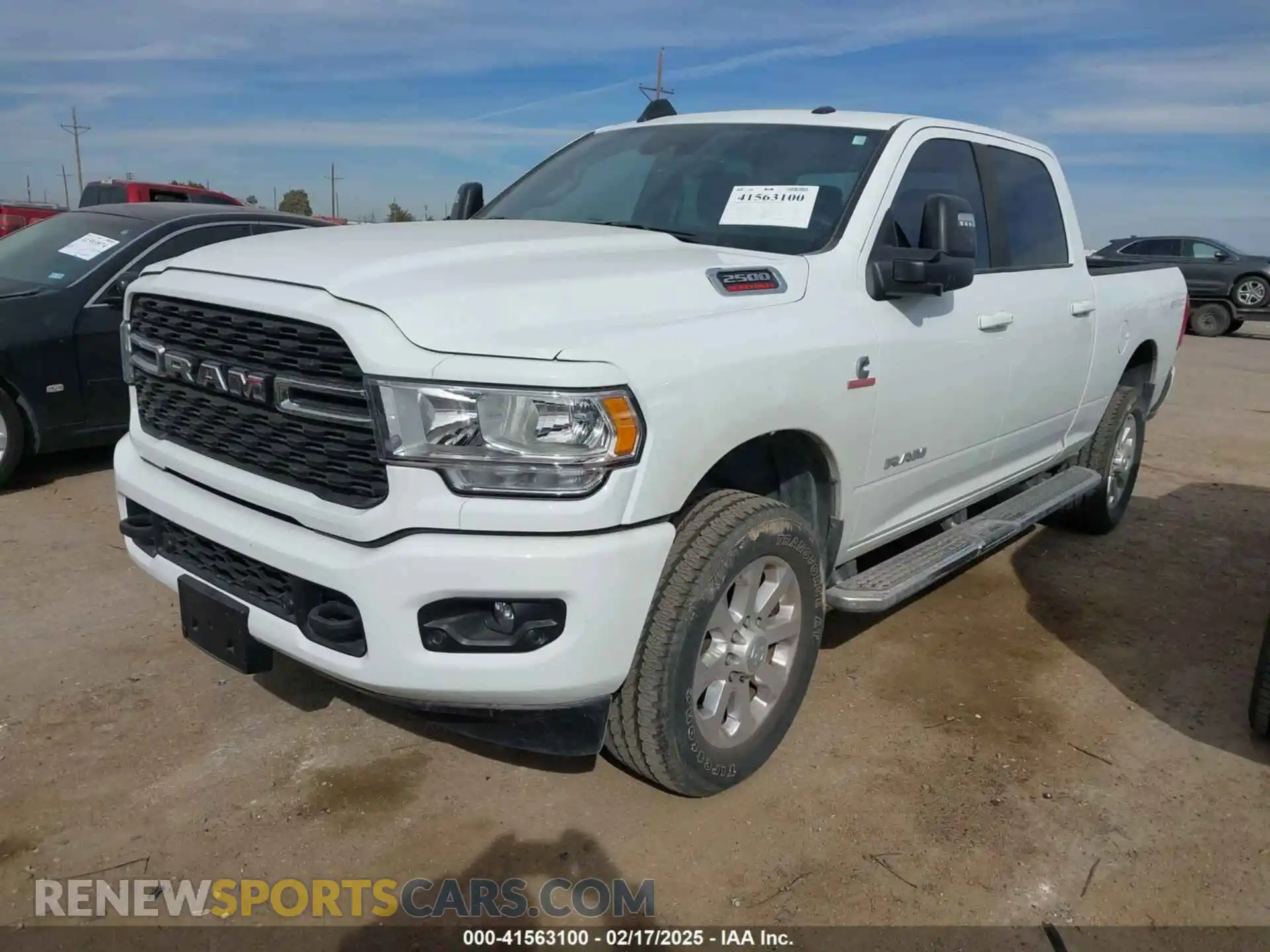 2 Photograph of a damaged car 3C6UR5DL0PG651540 RAM 2500 2023
