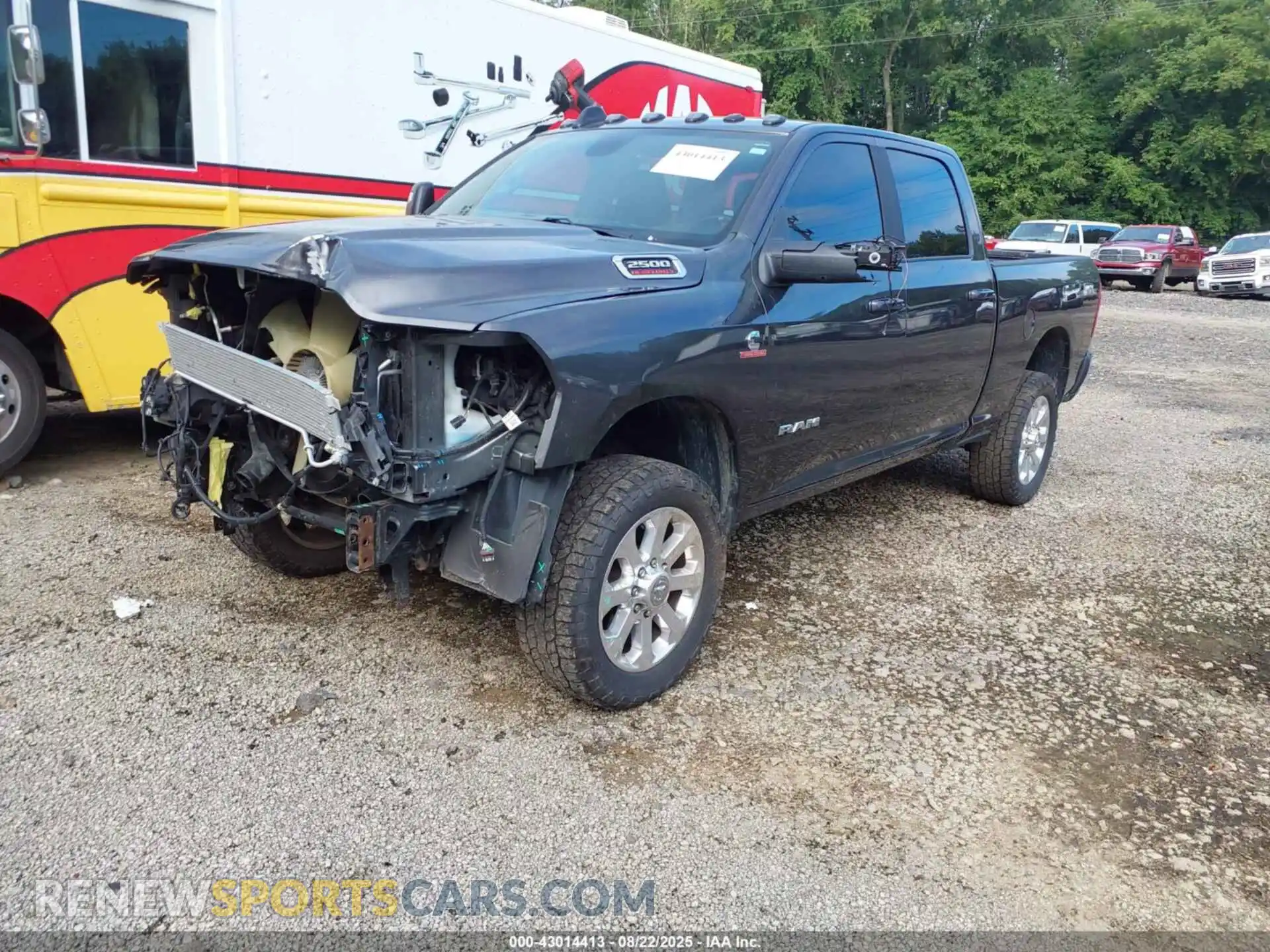 2 Photograph of a damaged car 3C6UR5DL1PG523713 RAM 2500 2023