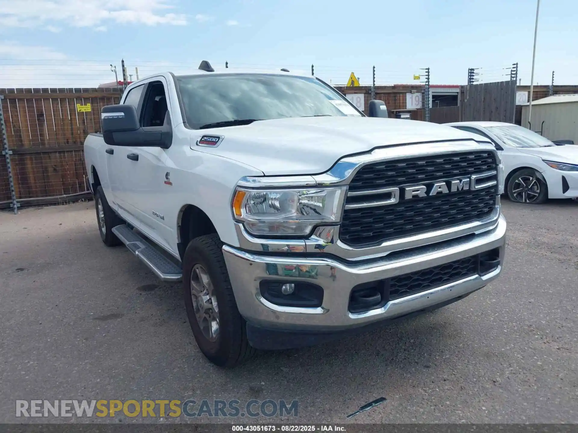 1 Photograph of a damaged car 3C6UR5DL2PG576310 RAM 2500 2023