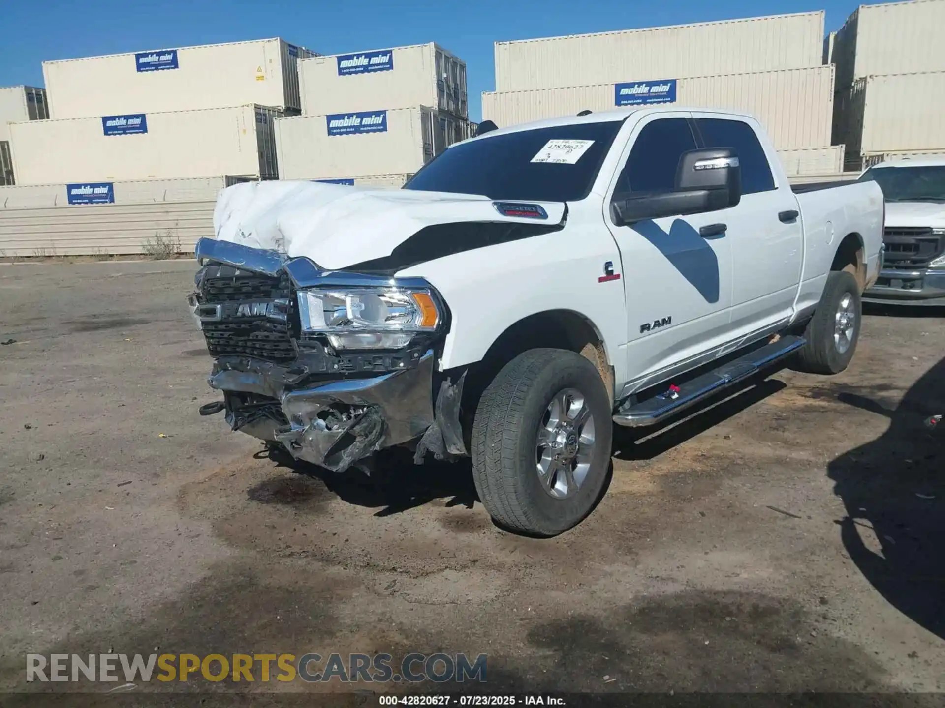 2 Photograph of a damaged car 3C6UR5DL2PG611184 RAM 2500 2023