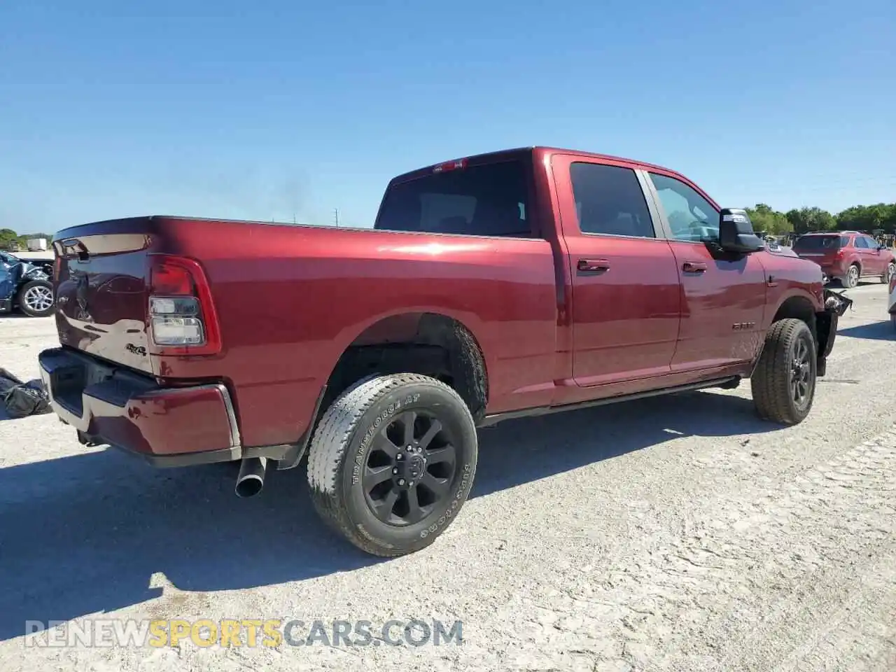 3 Photograph of a damaged car 3C6UR5DL3PG647496 RAM 2500 2023