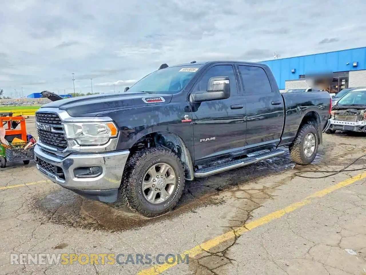 1 Photograph of a damaged car 3C6UR5DL4PG651217 RAM 2500 2023