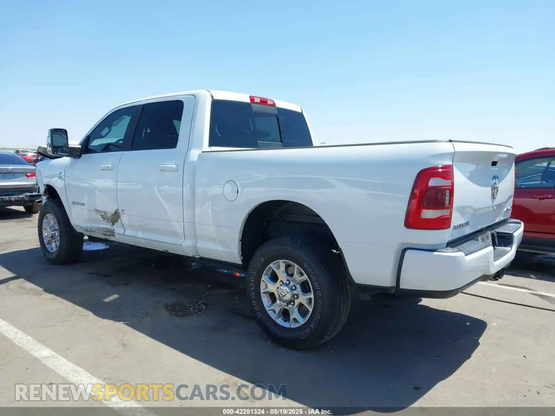 3 Photograph of a damaged car 3C6UR5FL2PG559276 RAM 2500 2023