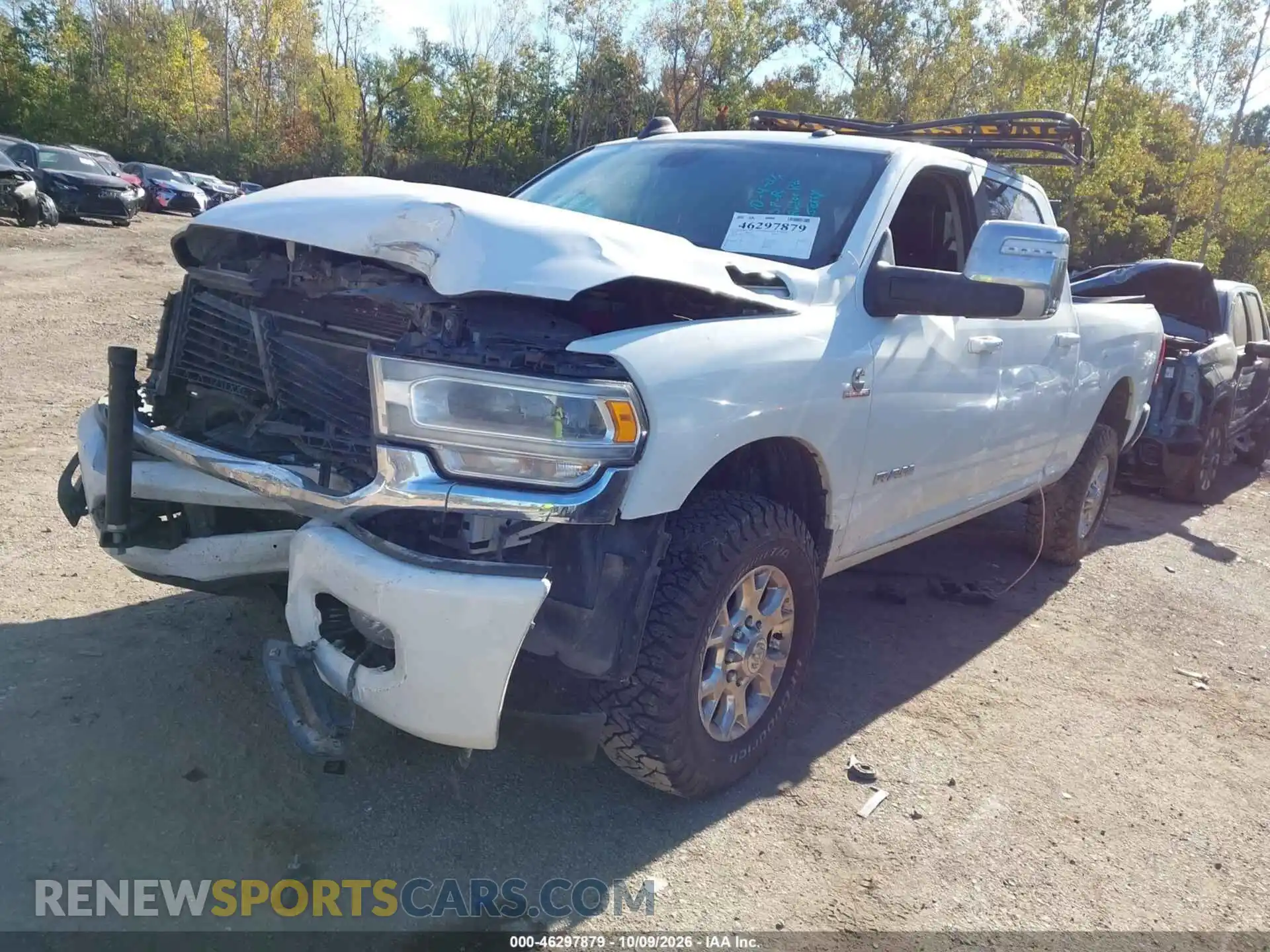 2 Photograph of a damaged car 3C6UR5FL8PG588409 RAM 2500 2023
