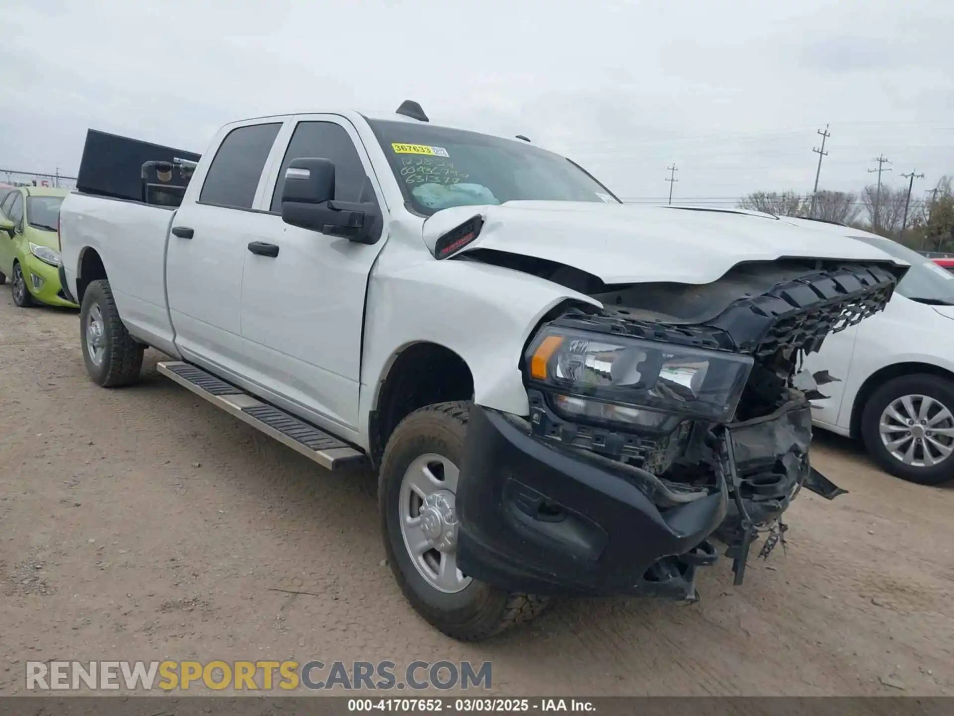 1 Photograph of a damaged car 3C6UR5HJ2PG631377 RAM 2500 2023
