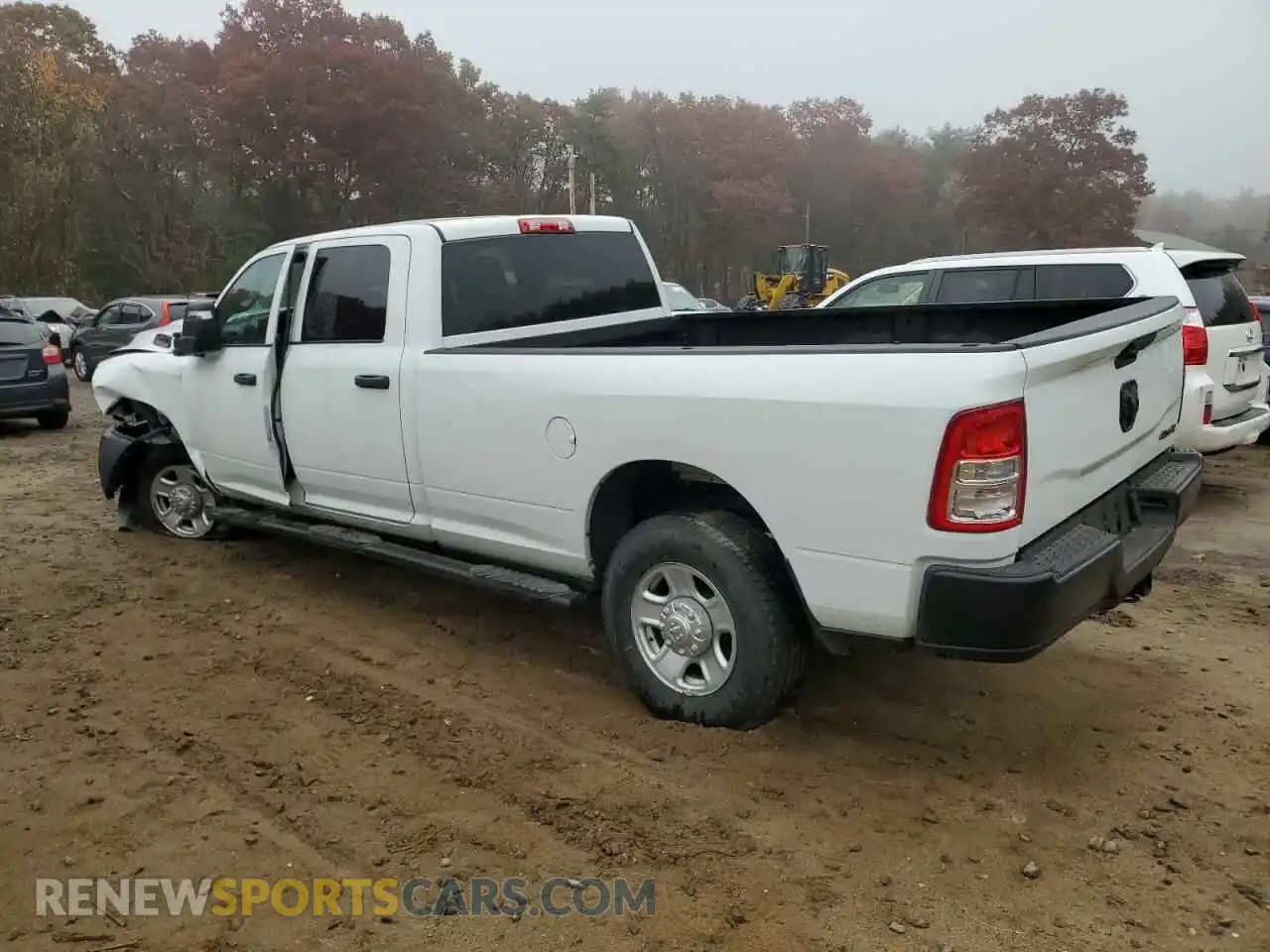 2 Photograph of a damaged car 3C6UR5HJ4PG589374 RAM 2500 2023