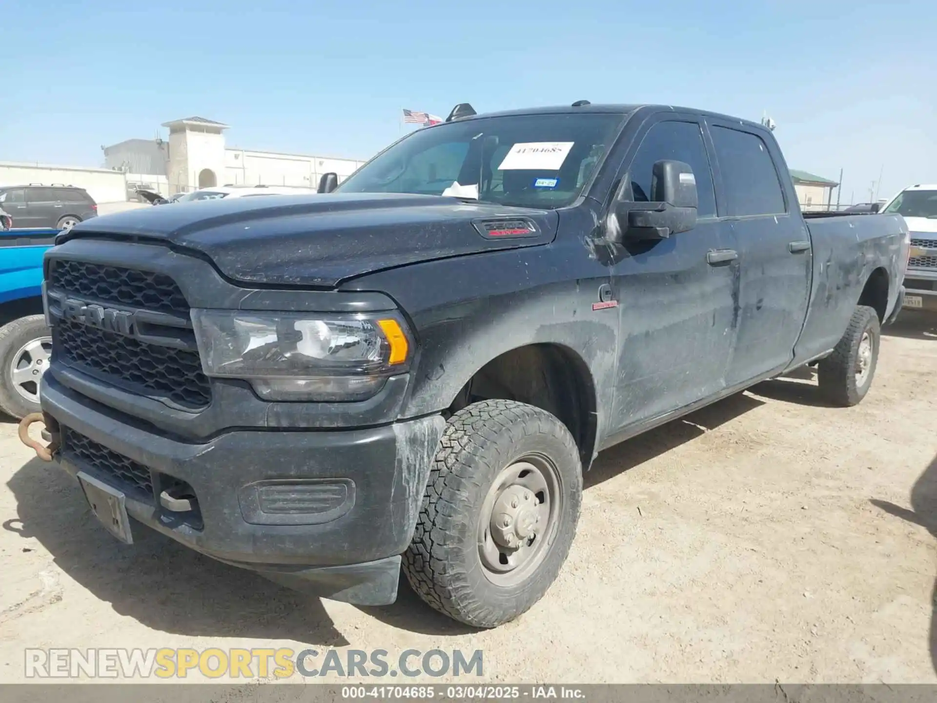 2 Photograph of a damaged car 3C6UR5HL2PG587012 RAM 2500 2023