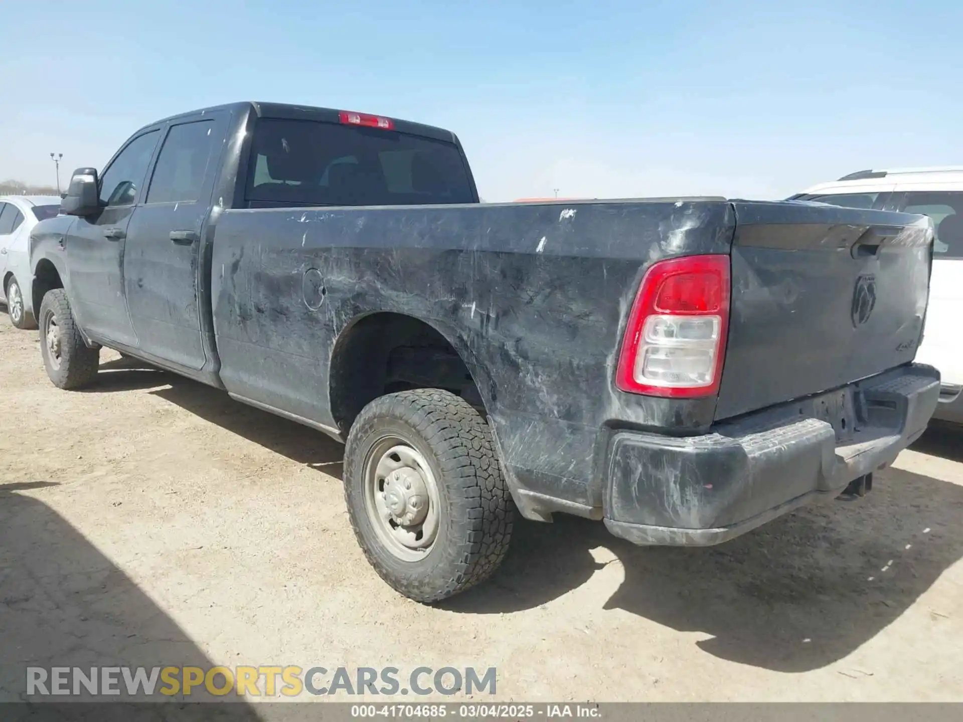 3 Photograph of a damaged car 3C6UR5HL2PG587012 RAM 2500 2023