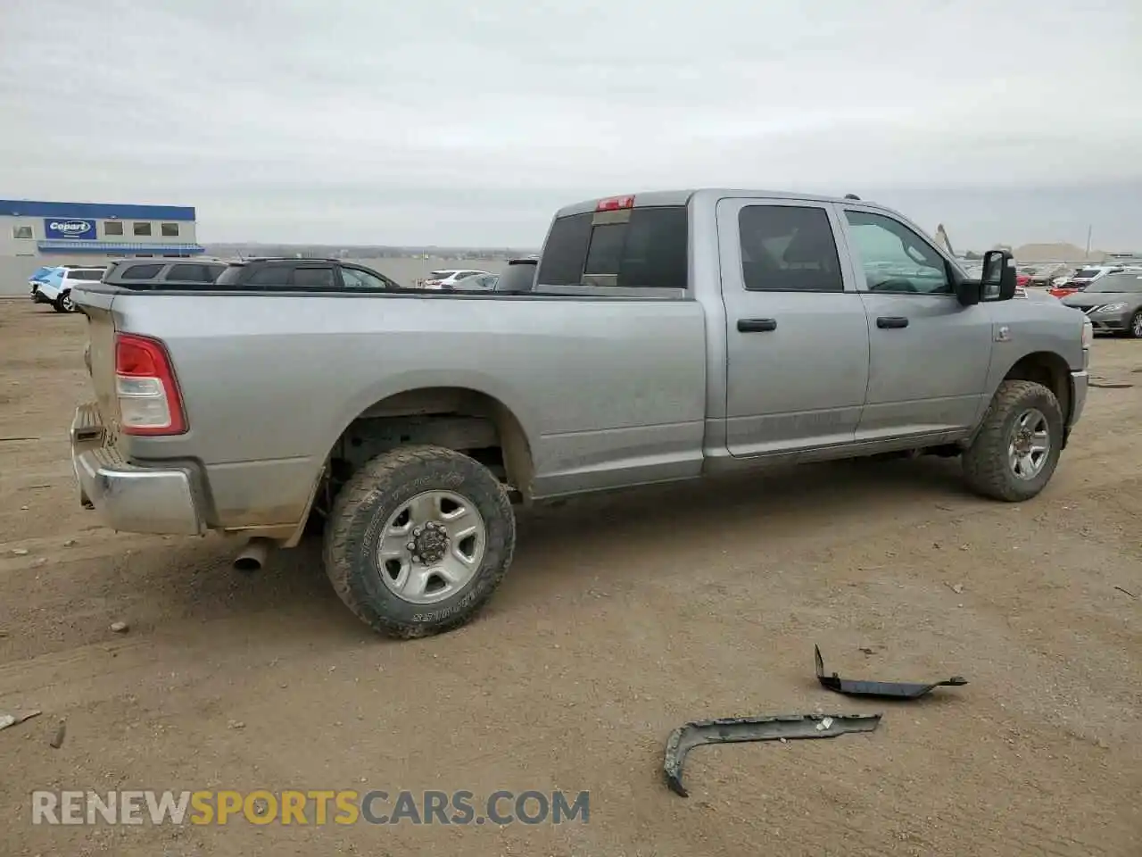 3 Photograph of a damaged car 3C6UR5HL7PG538646 RAM 2500 2023