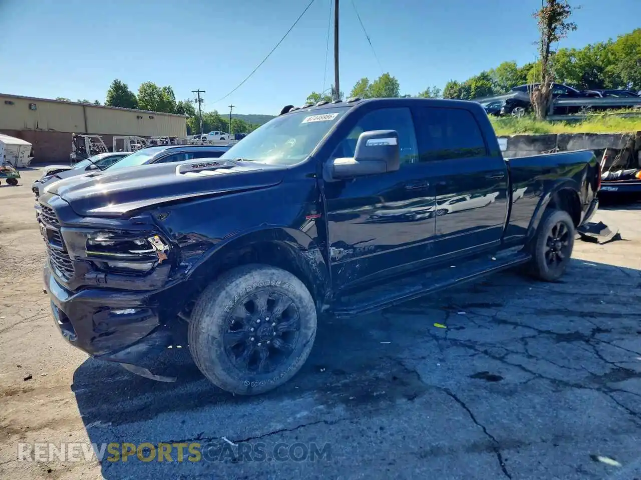 1 Photograph of a damaged car 3C6UR5SL6PG502780 RAM 2500 2023