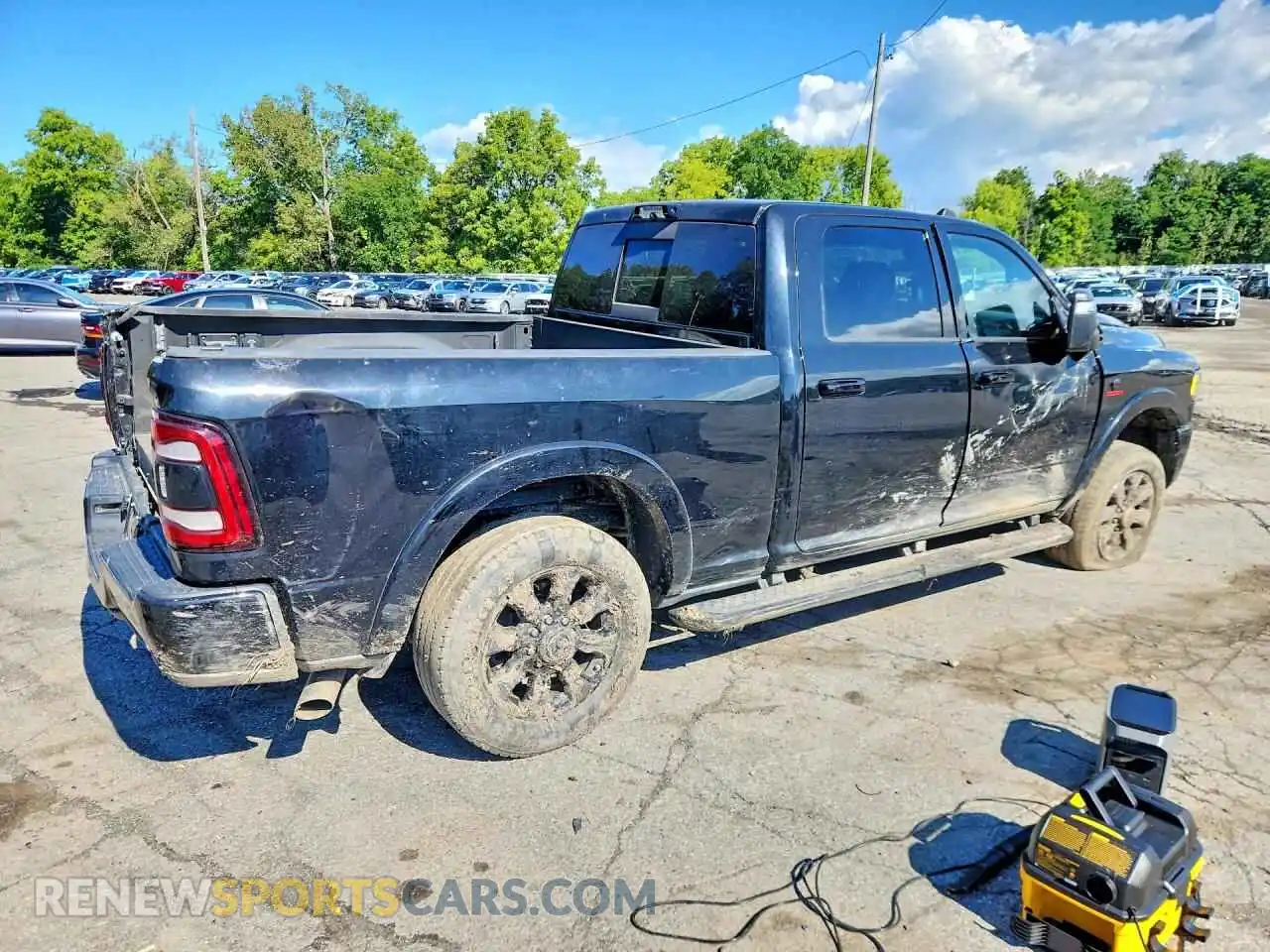 3 Photograph of a damaged car 3C6UR5SL6PG502780 RAM 2500 2023