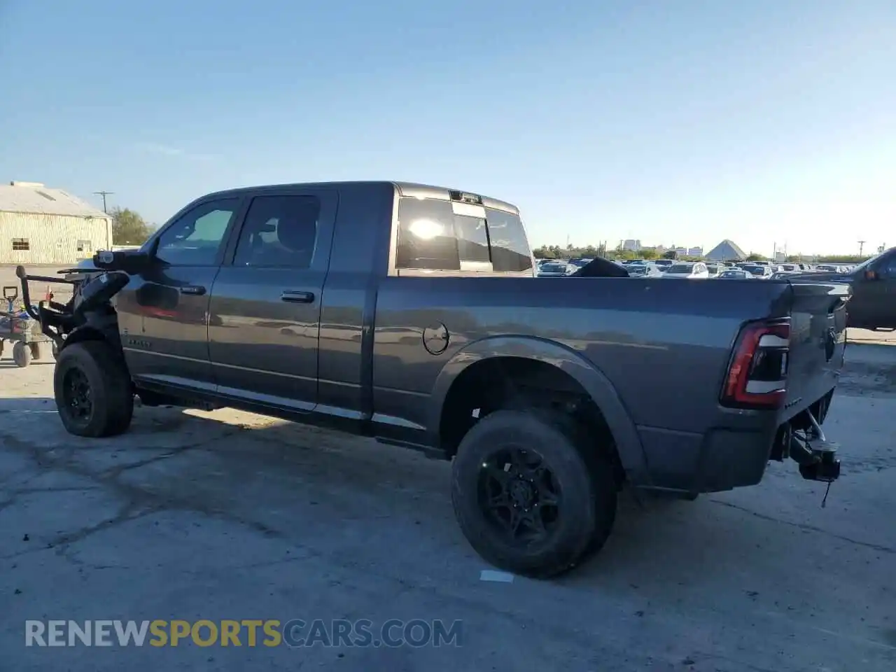 2 Photograph of a damaged car 3C6UR5TL9PG513898 RAM 2500 2023