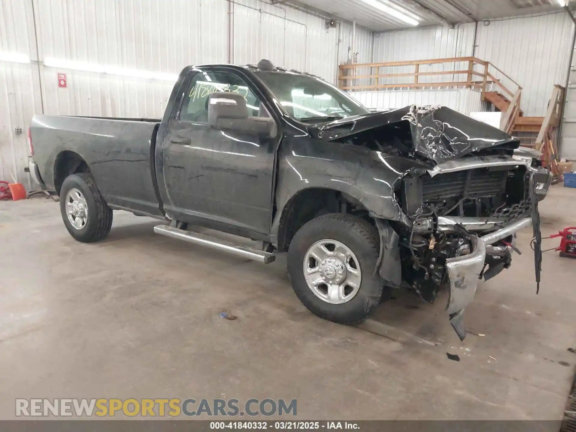 1 Photograph of a damaged car 3C6MR5AJ8RG298602 RAM 2500 2024
